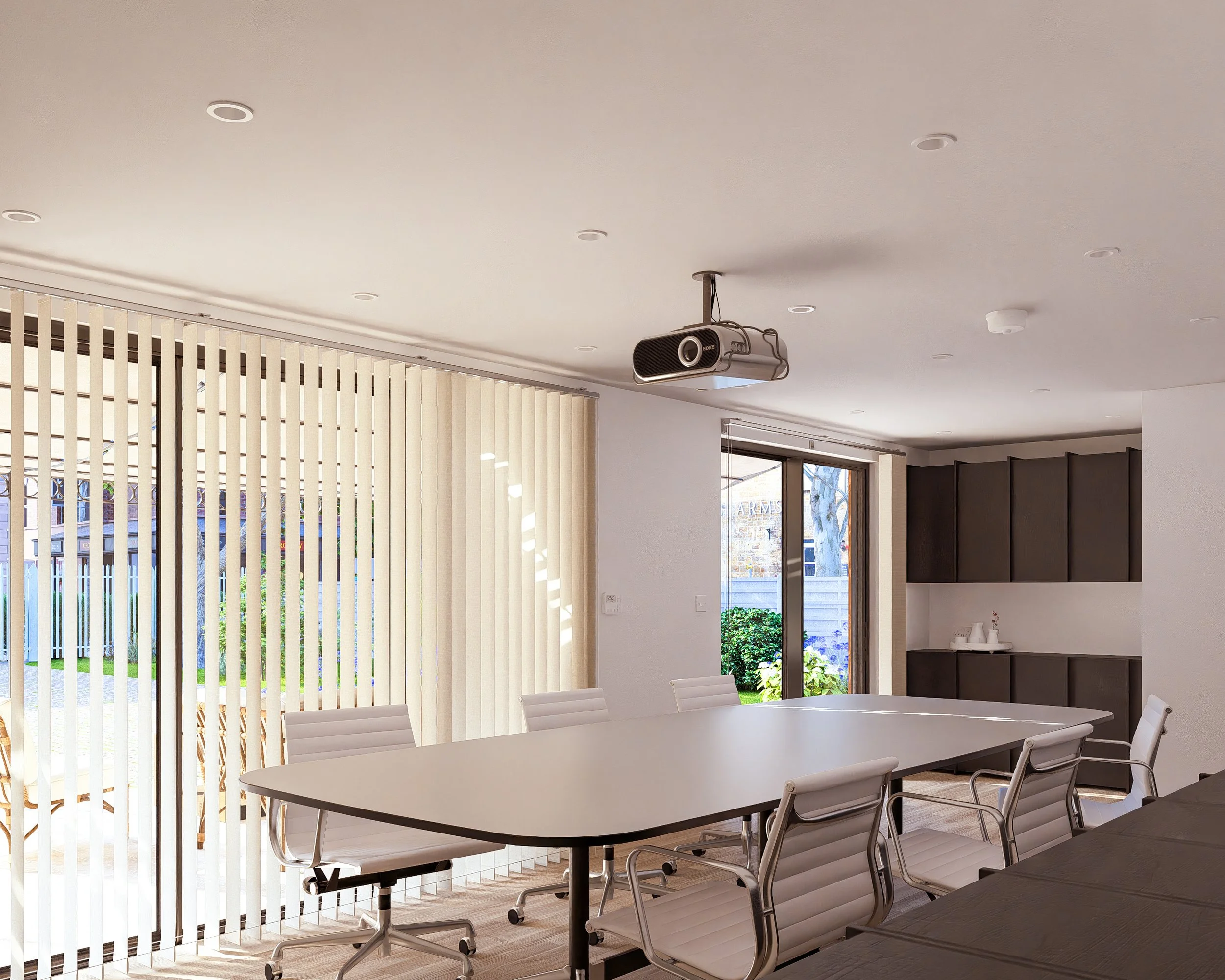 Bauhu hurricane resistant modular hospitality pod  conference room with white table, white chairs, vertical blinds, and a projector mounted on the ceiling. Large windows with glass sliding doors show a backyard garden.