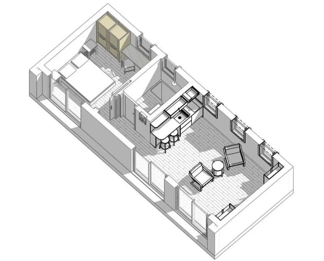 A 3D floor plan of a Bauhu hurricane resistant modular home apartment showing a bedroom with a bed and wardrobe, a bathroom with a shower, and an open living area with a kitchen bar, chairs, and a sitting area with two armchairs and a small table.
