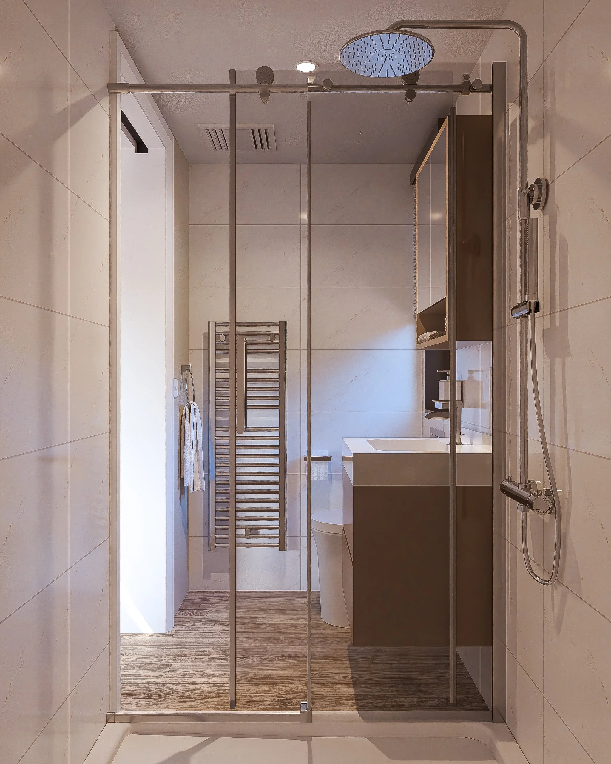 Modern Bauhu hurricane resistant modular hospitality pod bathroom with a glass shower enclosure, rainfall showerhead, wooden floor, wall-mounted towel warmer, white toilet, and a small vanity with a mirror.