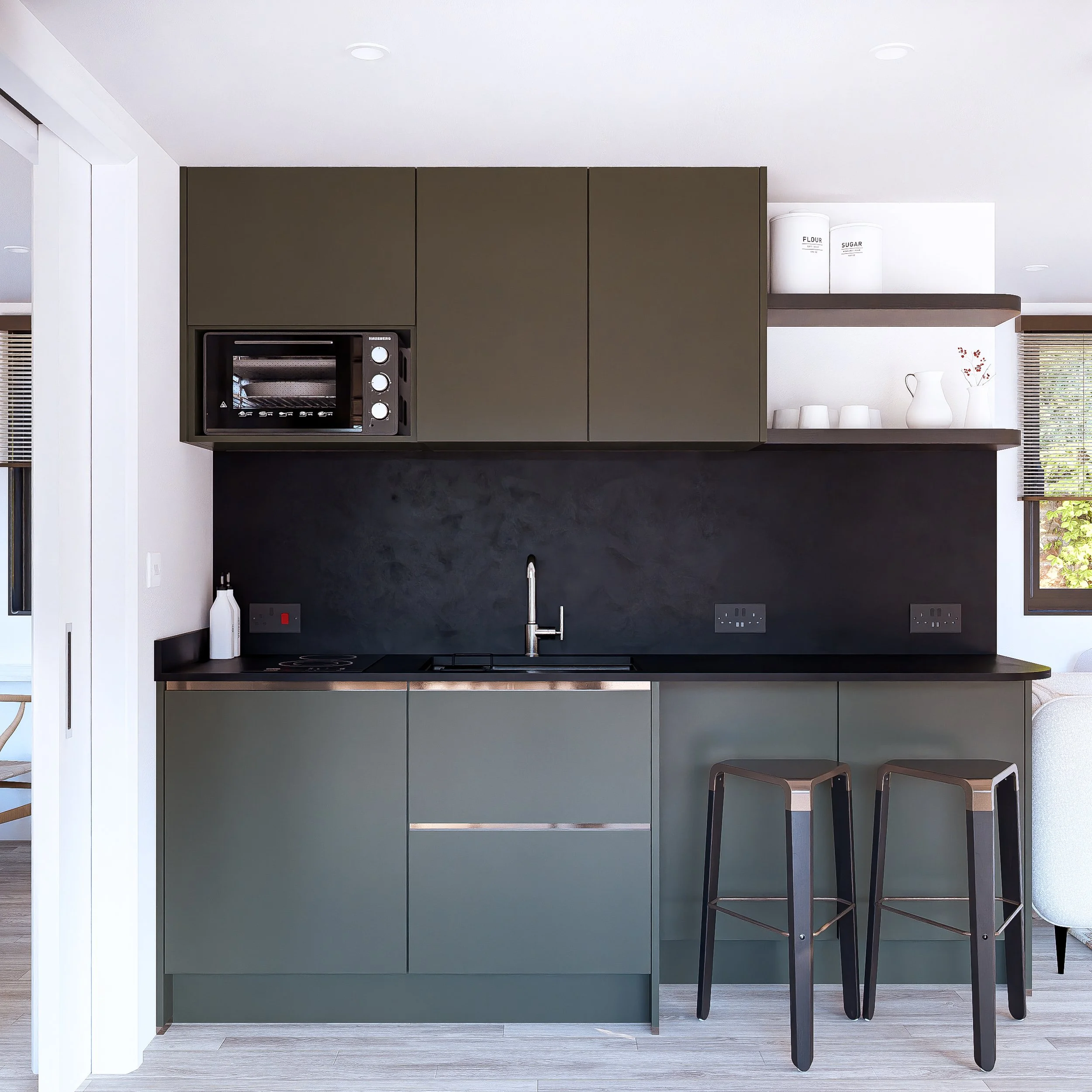 Modern Bauhu hurricane resistant modular hospitality pod kitchen with black countertops, green lower cabinets, black upper cabinets, a built-in microwave, two black bar stools, open shelves with white dishes and containers, and a window with blinds.