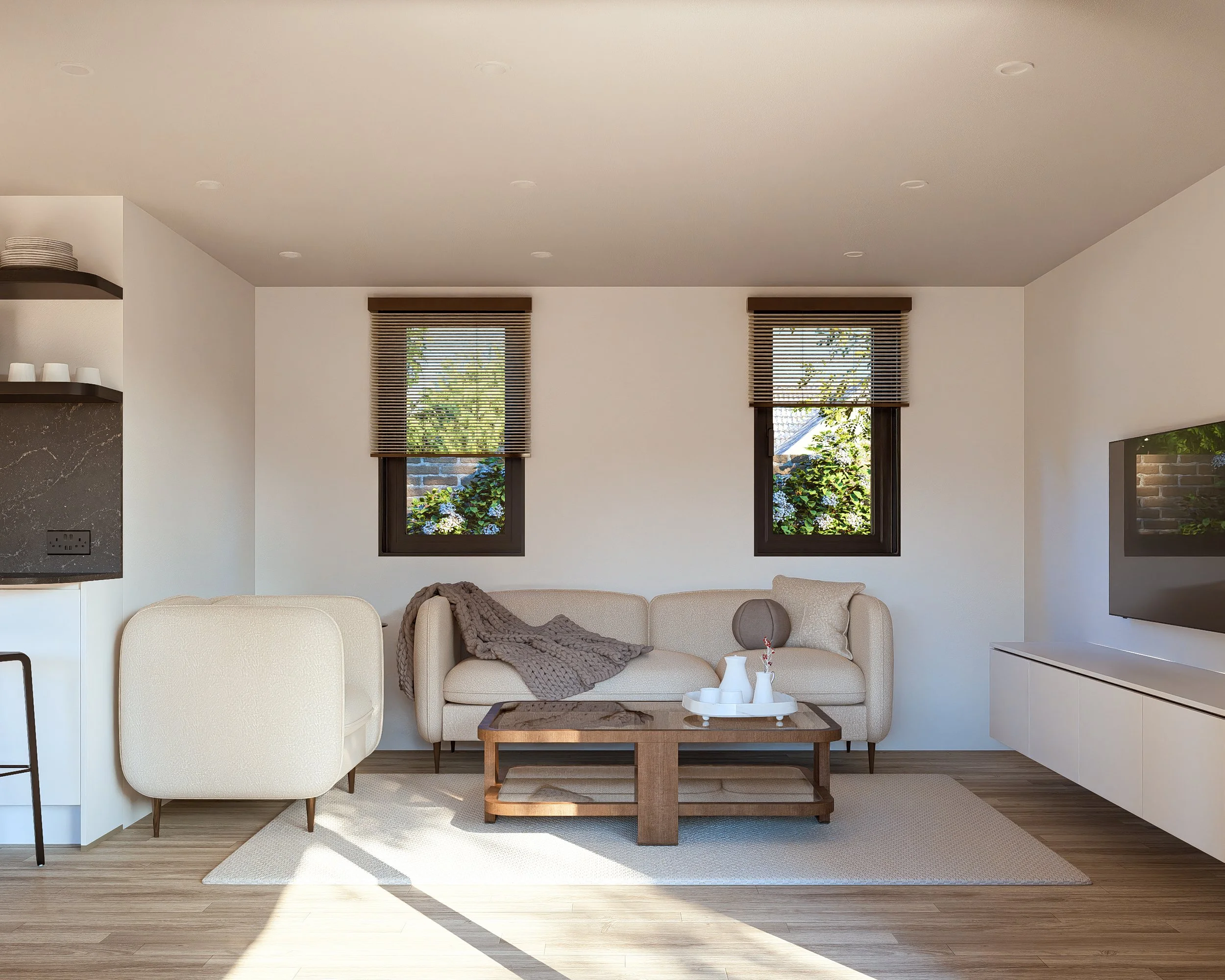 Bauhu hurricane resistant modular hospitality pod Living room with beige sofa, armchair, wooden coffee table, white tray with pitcher and cups, television, two small windows with blinds, wood flooring, and a beige rug.
