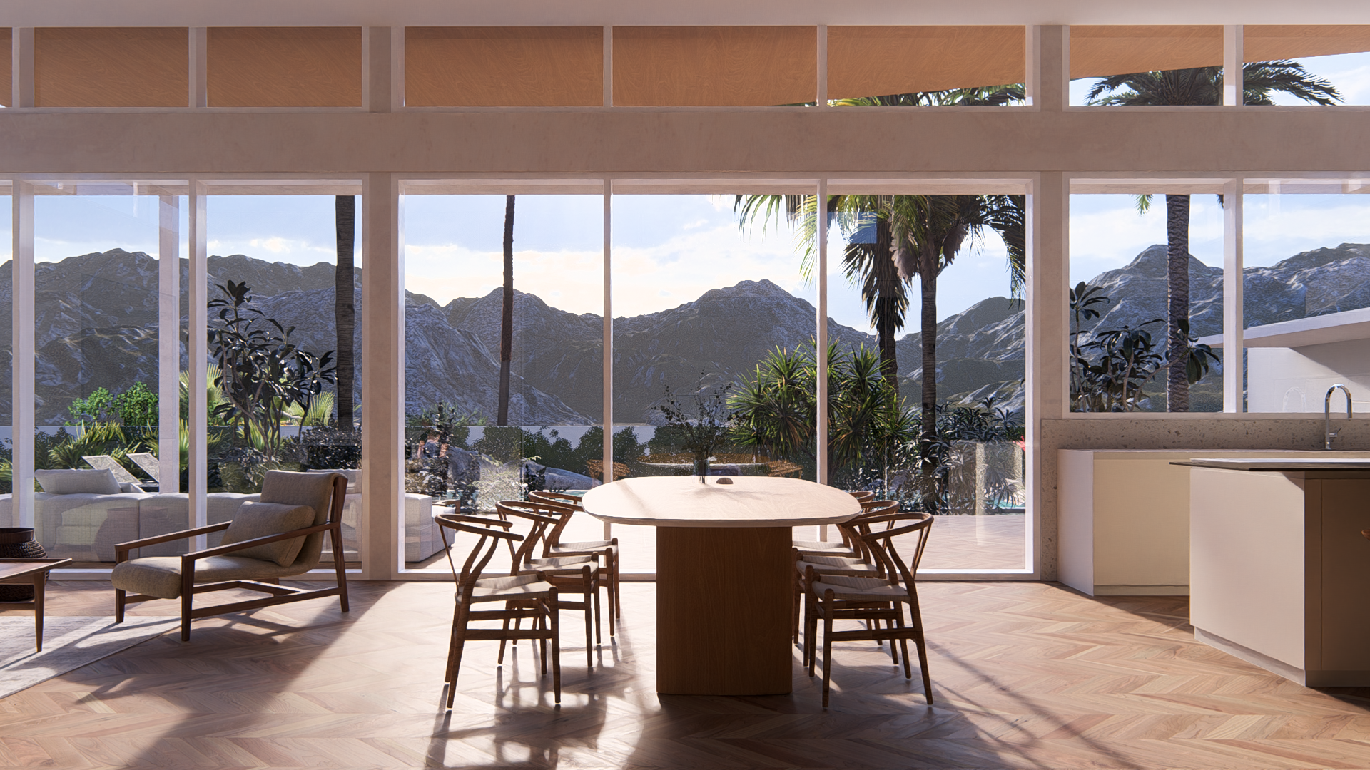 Modern modular, hurricane resistant steel frame Bauhu interior dining room with round table and chairs, large glass windows overlooking mountains, palm trees, and patio with outdoor furniture.