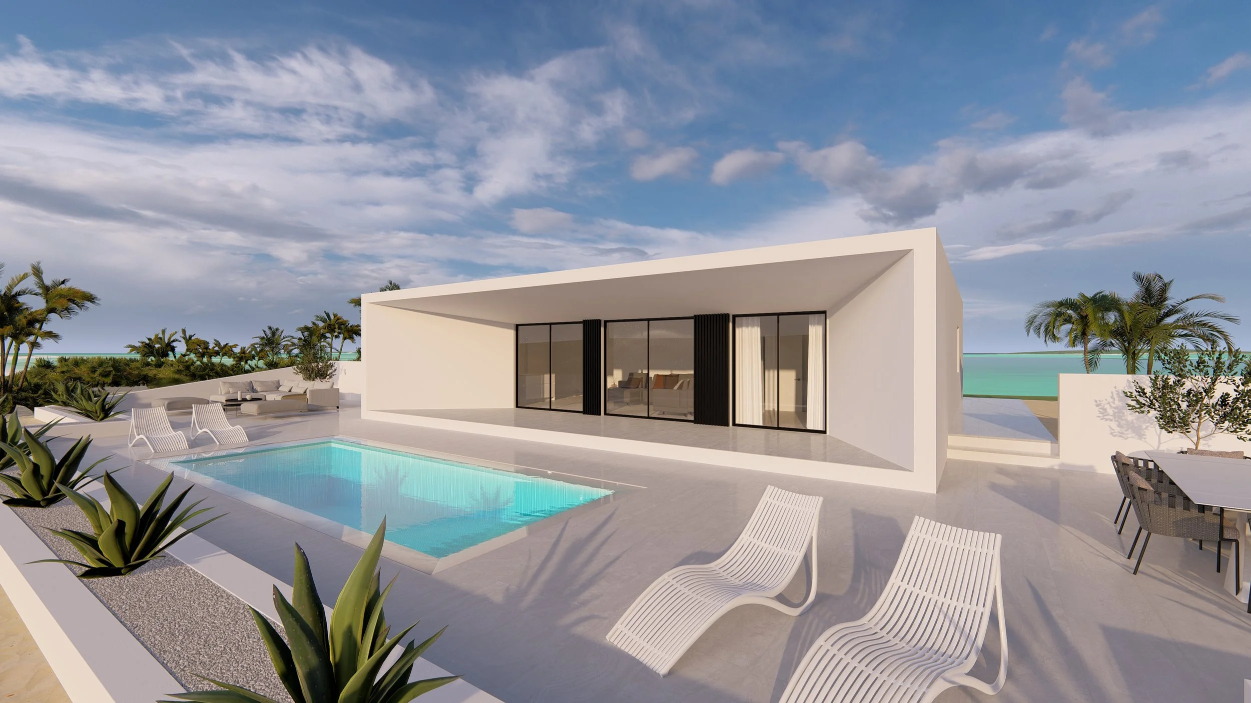 Modern Bauhu hurricane resistant modular home white house with a flat roof and large glass doors located on a beachside with a swimming pool and lounge chairs.