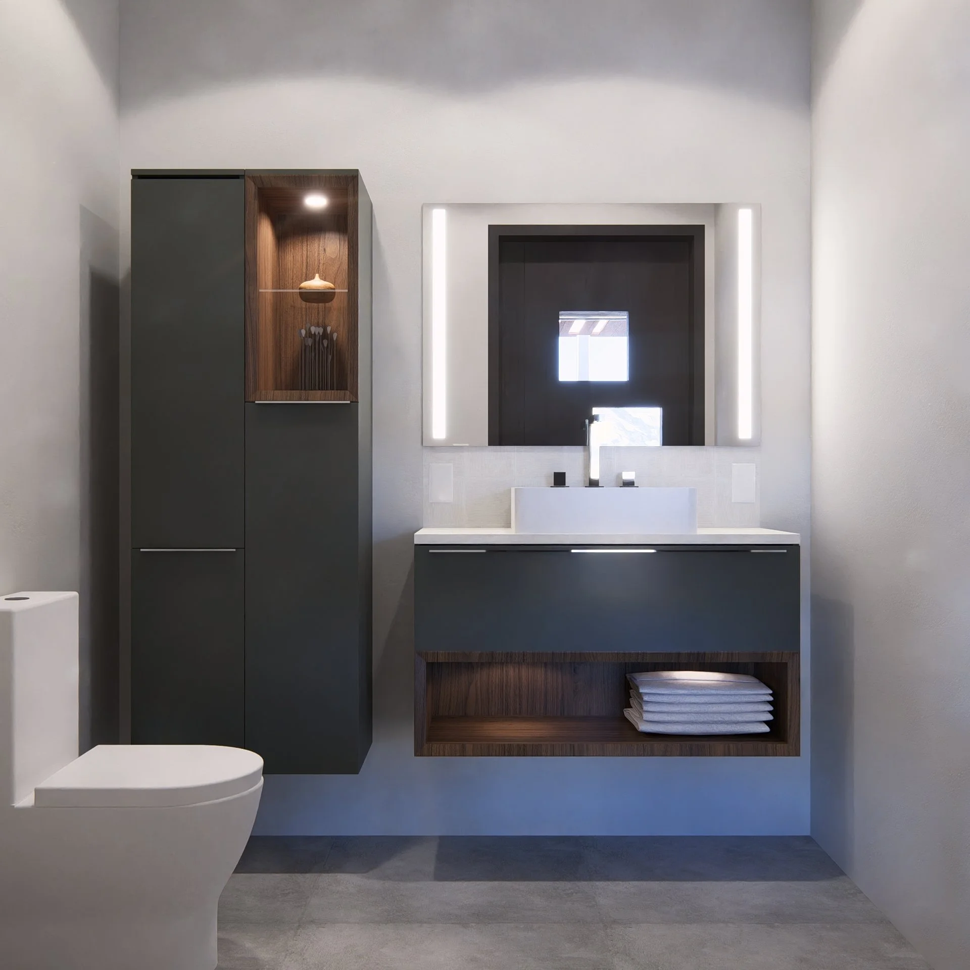 Modern modular, hurricane resistant steel frame Bauhu bathroom with a dark wood and gray vanity, large mirror with LED lights, tall gray cabinet, and a white toilet.