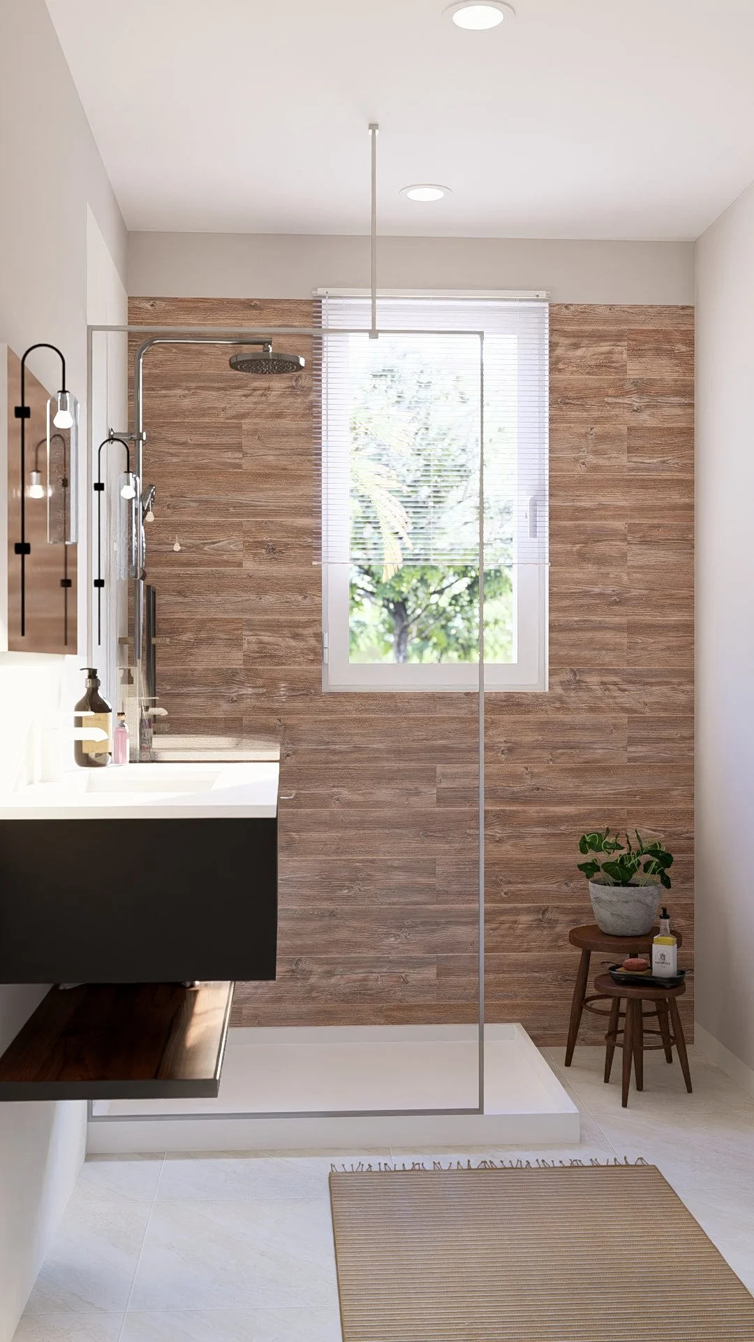 Modern modular, hurricane resistant steel frame Bauhu bathroom with wooden accent wall, white and black vanity, window with blinds, and a glass shower enclosure. Small plant on a stool, natural light, and beige floor tiles.
