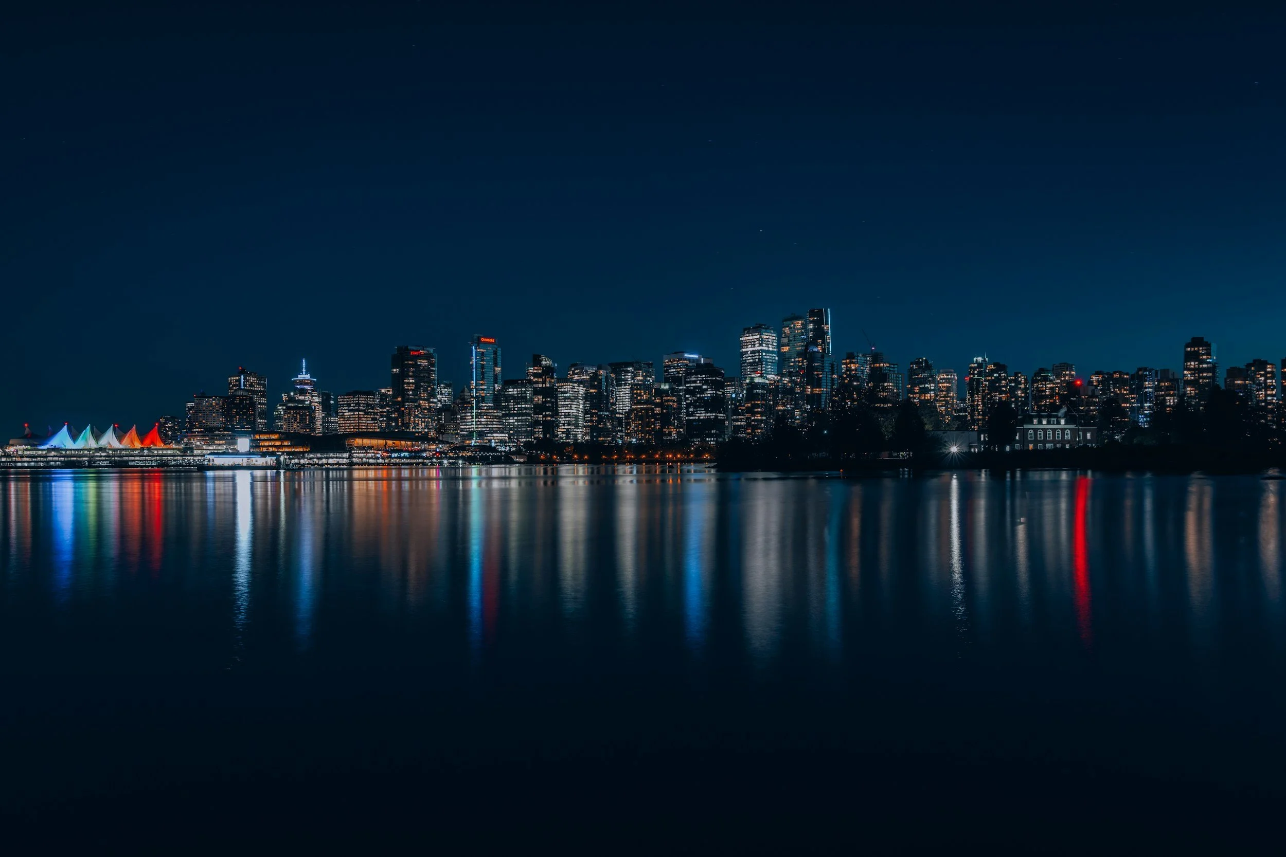 Vancouver skyline at night, served by Romano Remote virtual assistants in British Columbia