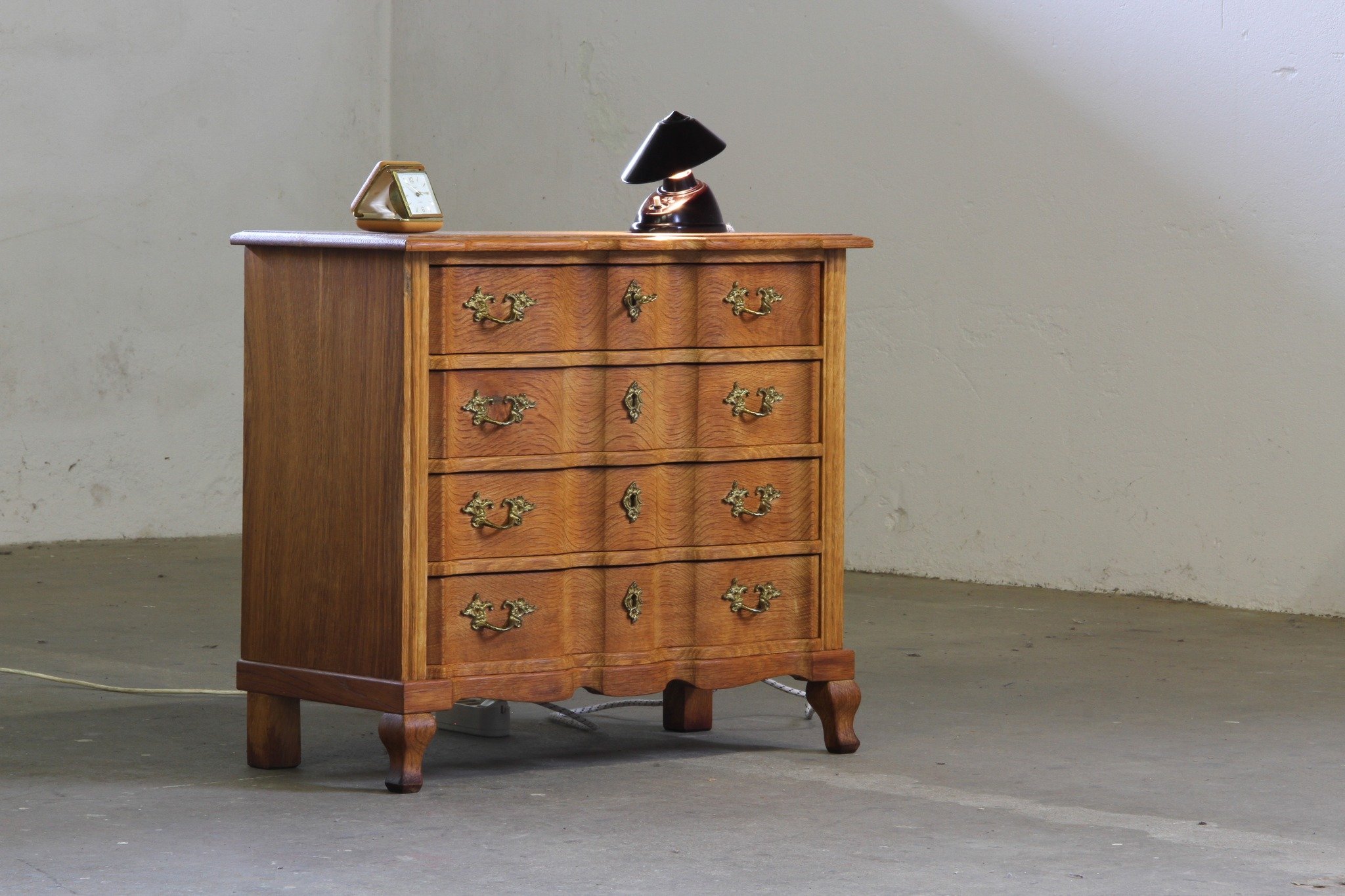 Vintage 1960s Danish Brutalist Light Oak Dresser, Kj&aelig;rnulf &amp; French Style 

SKU: mb00041

Denmark meets France in this one-of-a-kind 1960s oak dresser. French-curved legs, Baroque-inspired wood carvings, original brass handles, and a workin