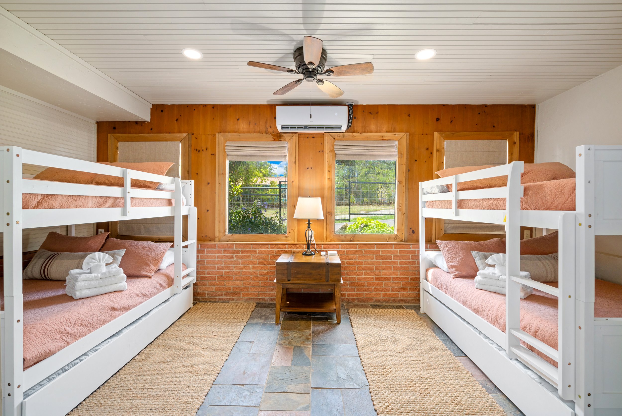 Bunk beds in large bed room with beautiful view.