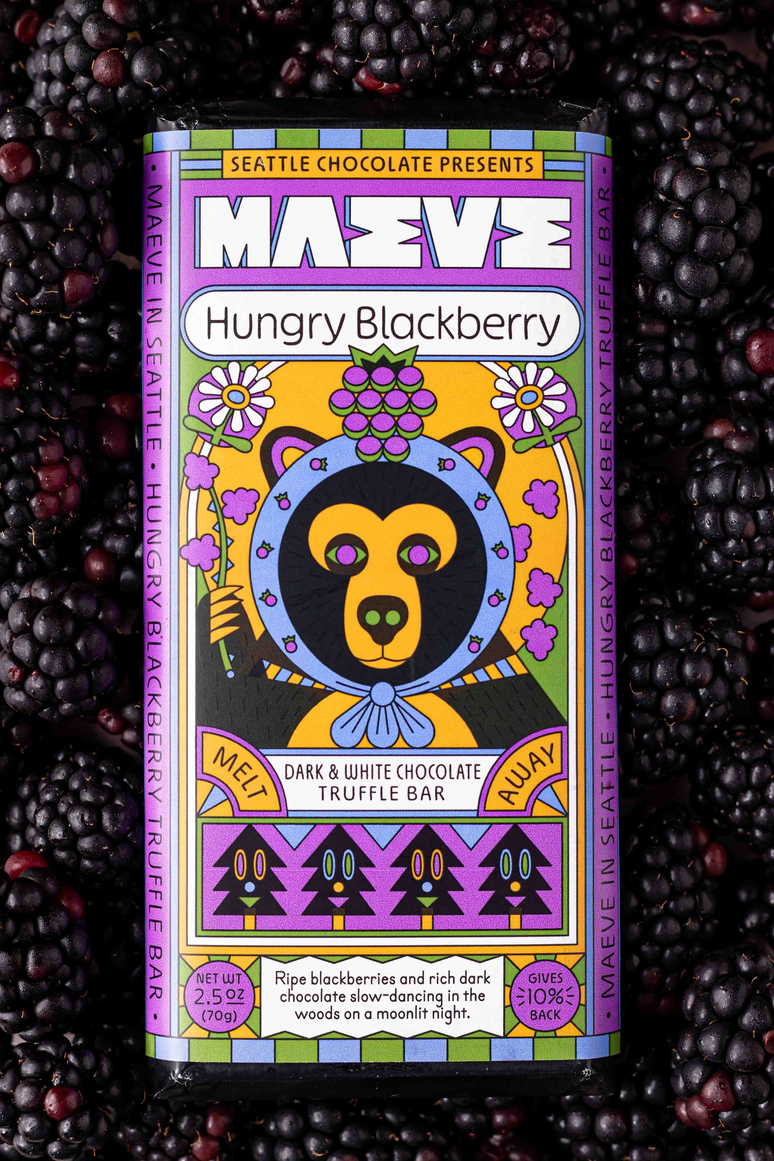 Product photo of a chocolate bar with blackberry background