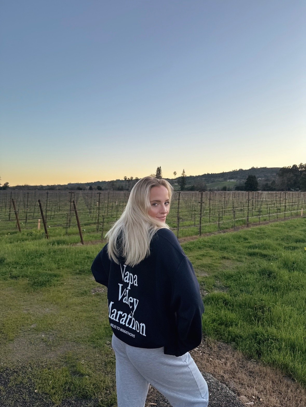 Madeline Beitz wearing Miles to Marathons Sweatshirt in Napa Valley