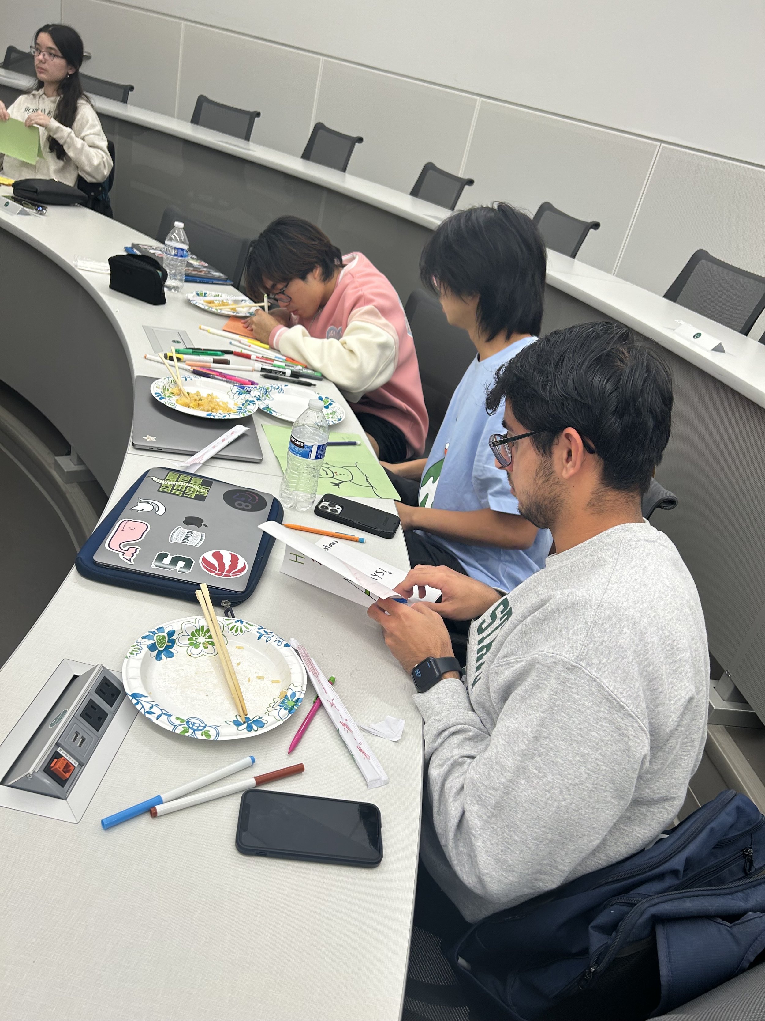 Our members creating cards for the hospital during Cocoa and Cards!
