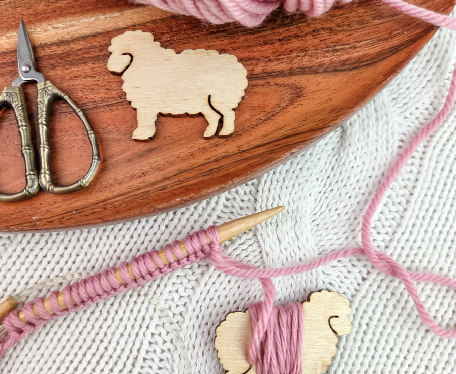 Sheep bobbins with Knitting.png