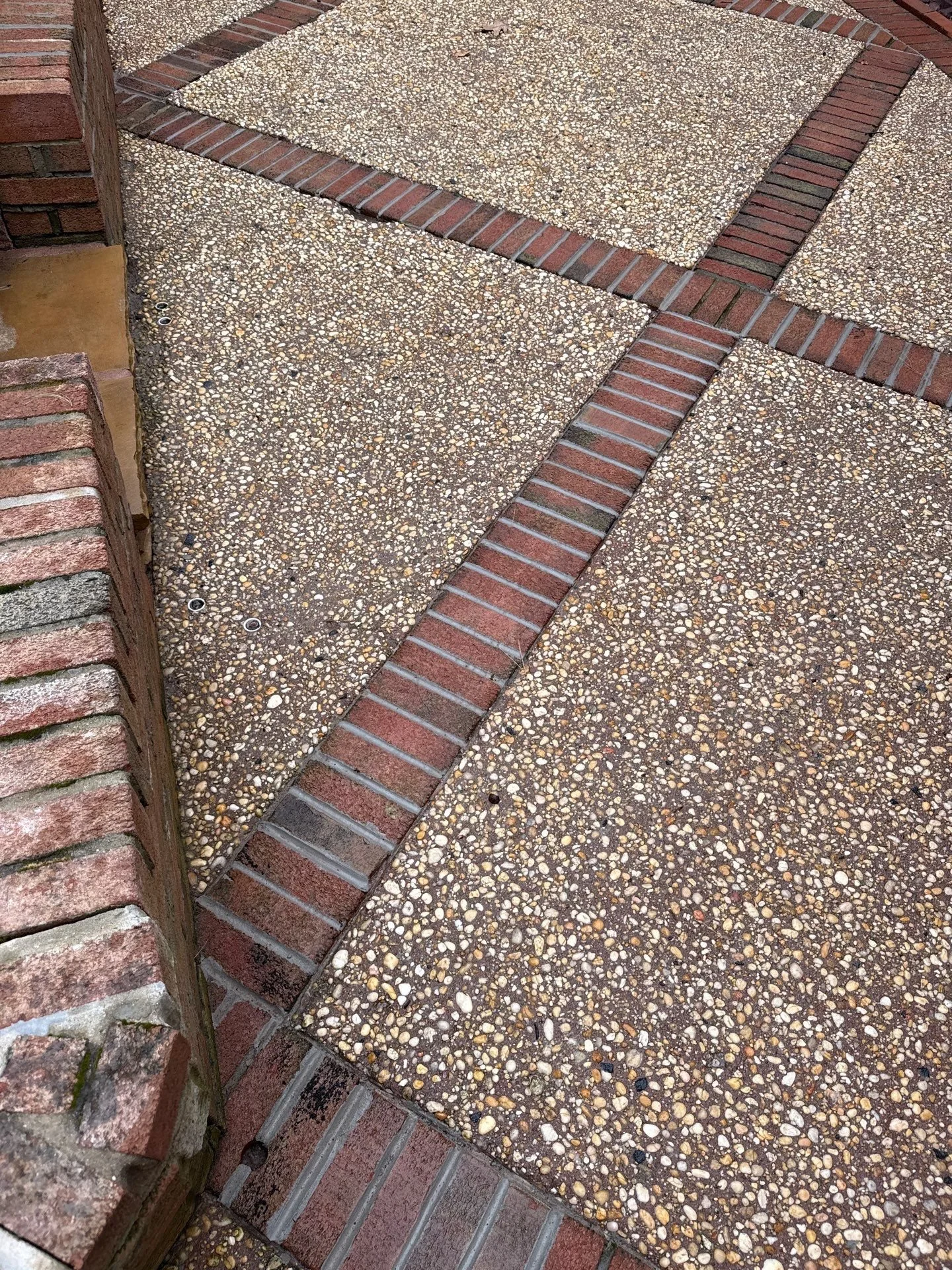 Restoring a Decorative Aggregate Walkway with Brick Inlay
