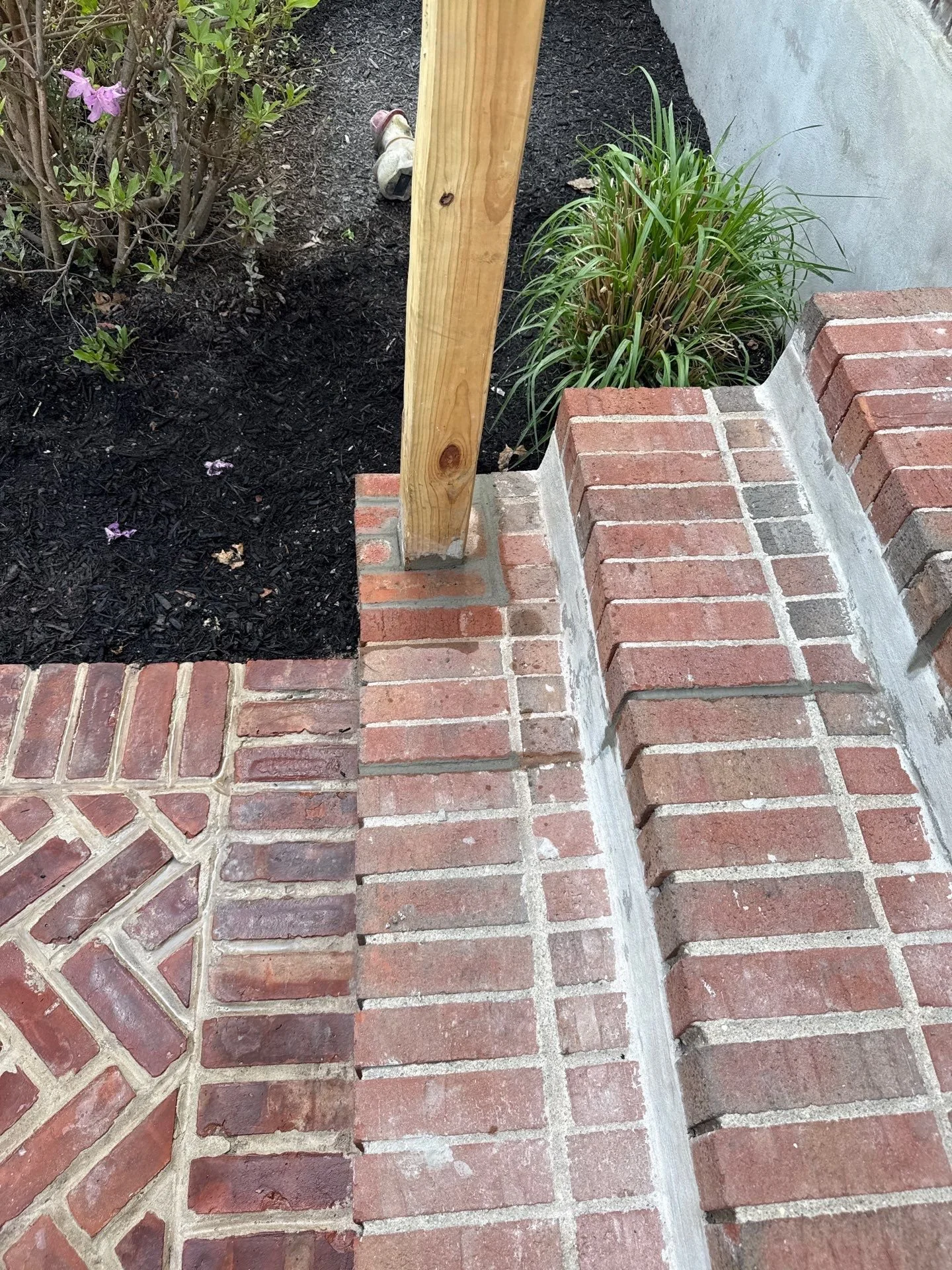 Restoring Brick Steps and a Post Base to Their Former Strength