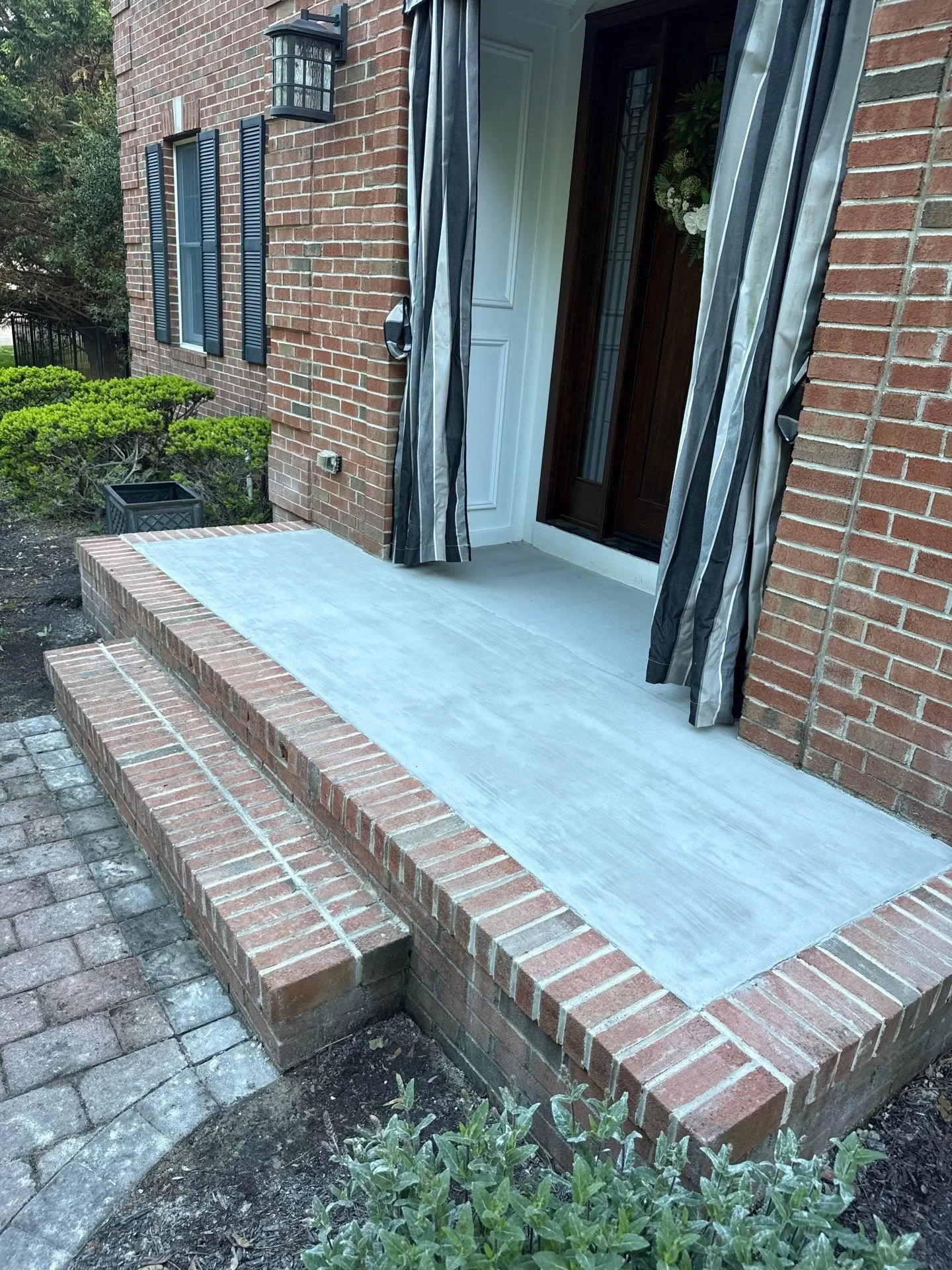 A Fresh Face for a front entry: porch resurfacing done right