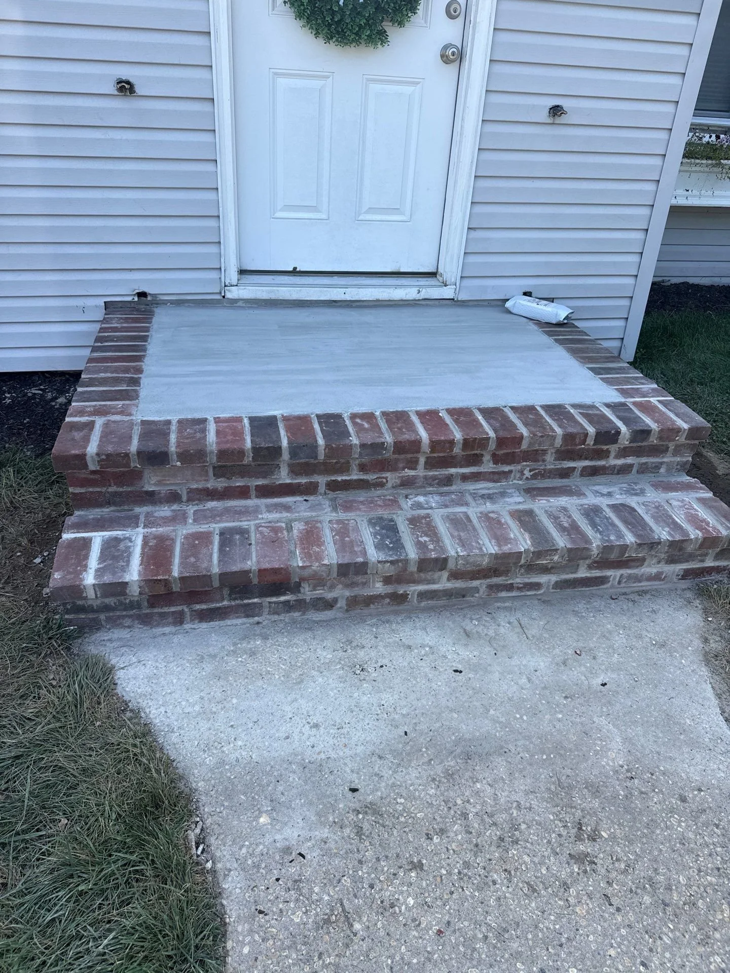 Brick Front Stoop Rebuild Restpres a safe, solid entry