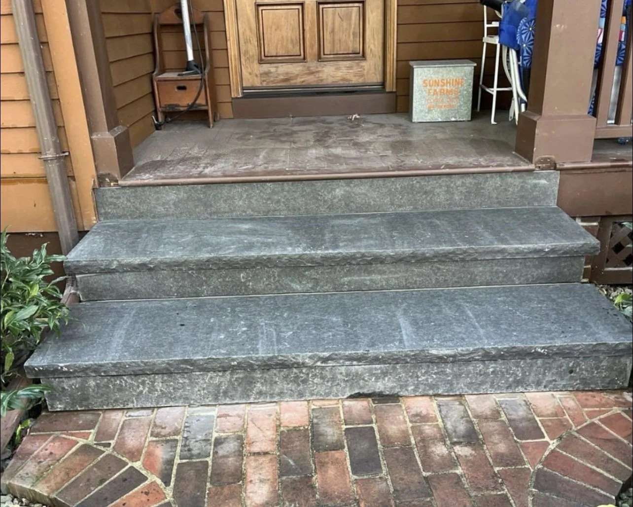 Bluestone steps installation at front porch in Monmouth County NJ featuring durable natural stone treads and clean masonry construction.