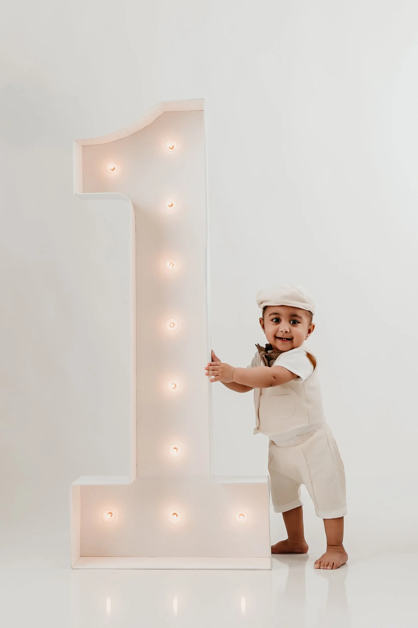 Little boy smiling during a children's portrait session