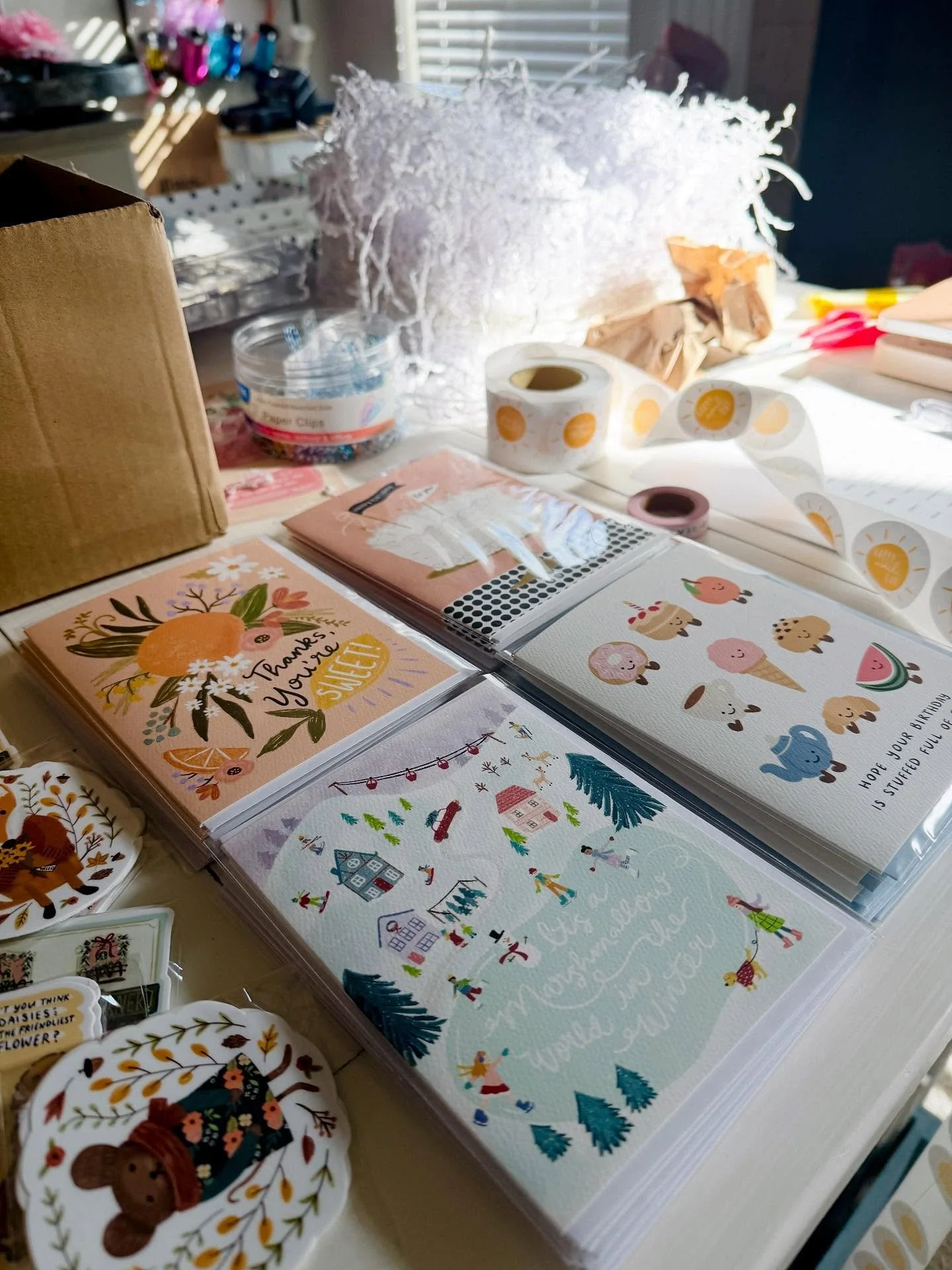 It’s been a whirlwind of holiday shop orders over here.. boxes, cards, stickers, and bookmarks everywhere! 🌪️💌 I’ve been packing up so many happy bundles for shops, and I’m just feeling incredibly grateful for every single order a
