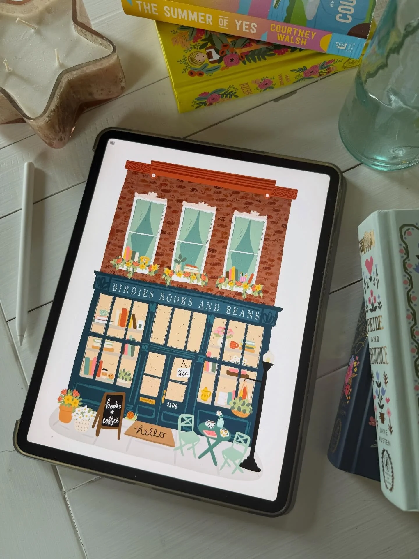 My last commission of 2025 and I couldn&rsquo;t be more excited to finally share it! 📚 🥰

This cuuute little storefront was SO much fun to illustrate!  I liked filling the windows with all the tiny bookish and coffee shop details.. plus vintage ele