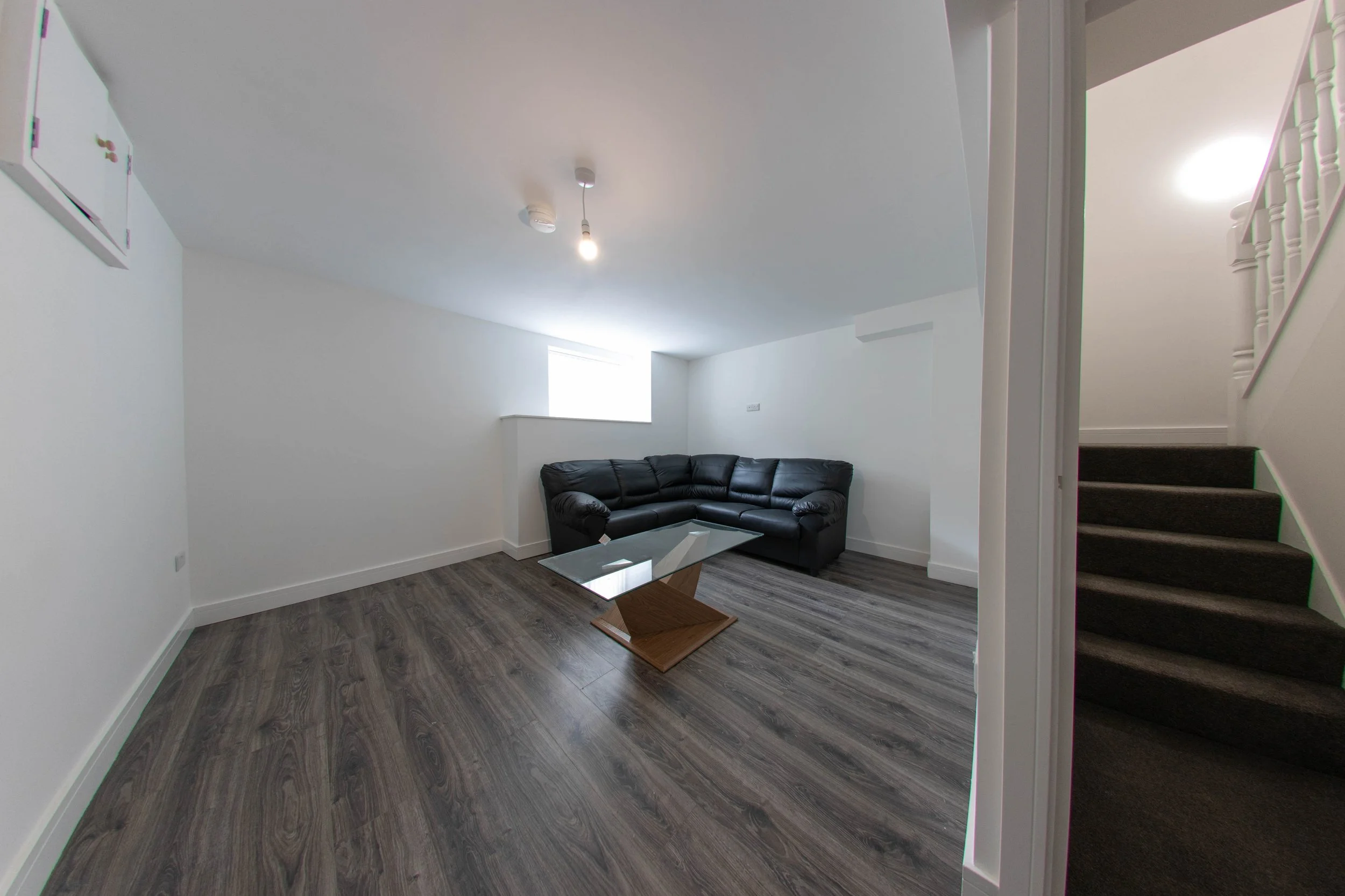 modern-minimalist-living-room-with-a-dark-wood-flo-2026-04-15-05-02-23-utc.jpg