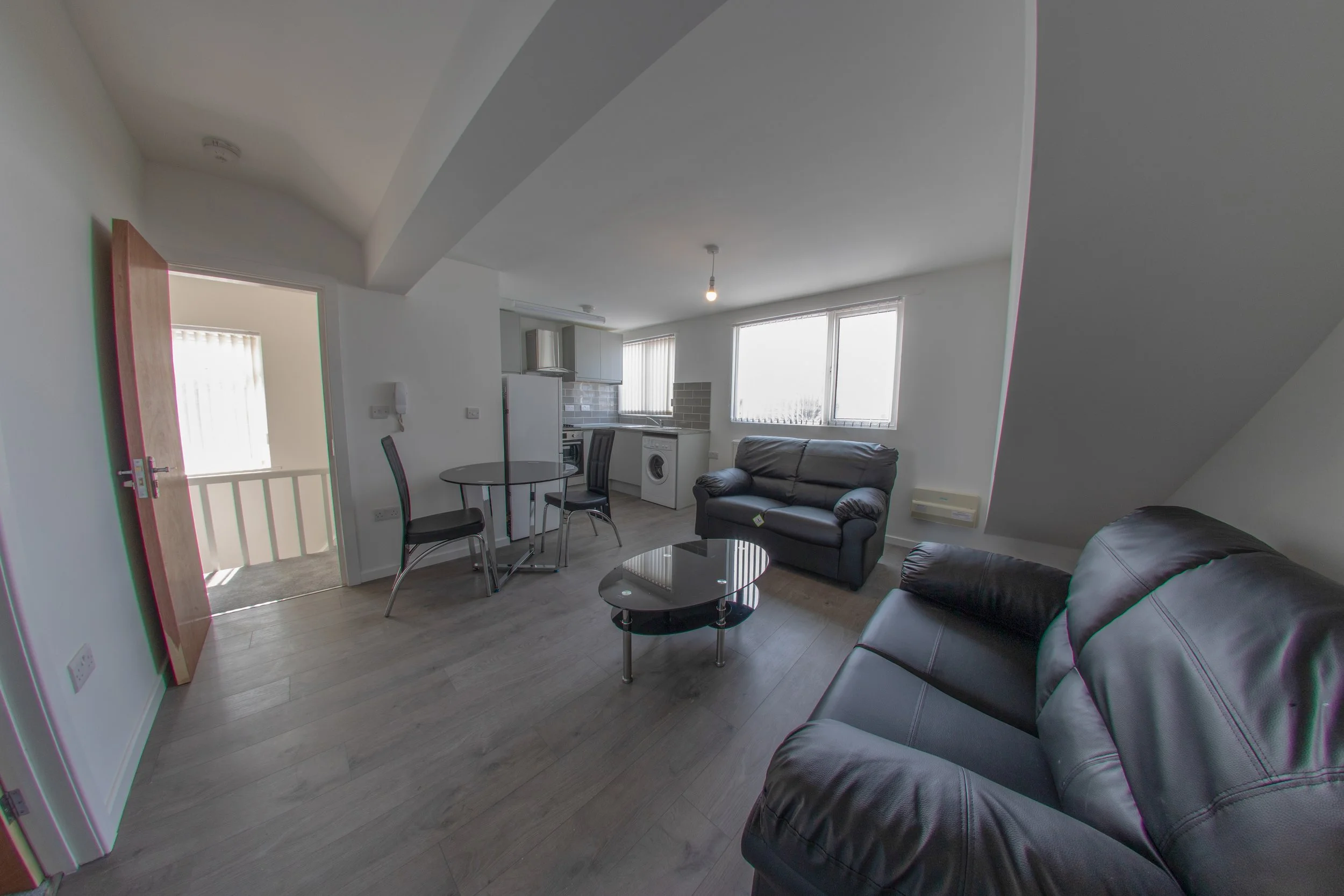 comfortable-apartment-interior-with-black-furnishi-2026-04-15-05-38-08-utc.jpg
