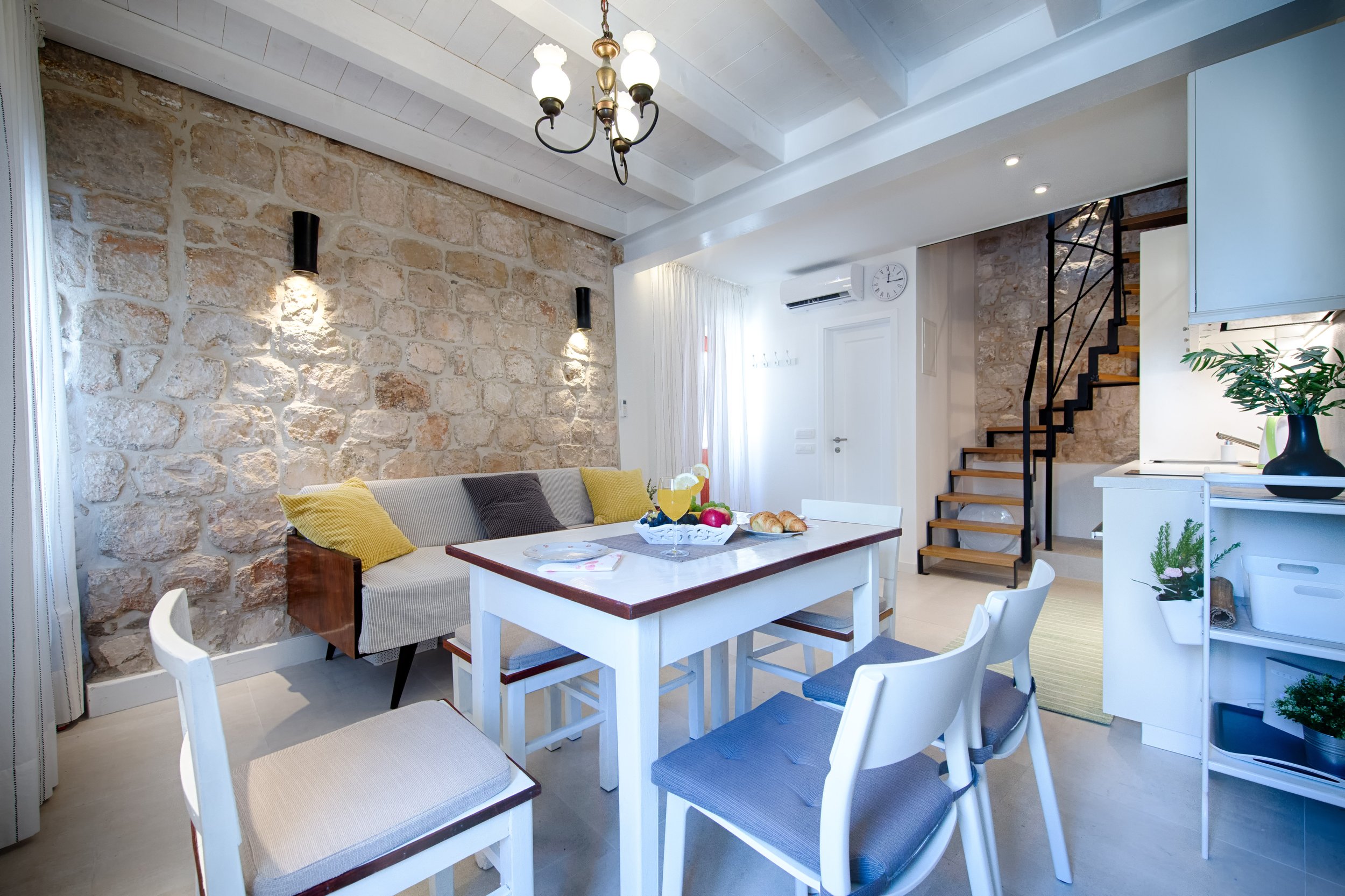 elegant-dining-room-with-stone-wall-interior-desig-2026-04-15-06-15-48-utc.jpg