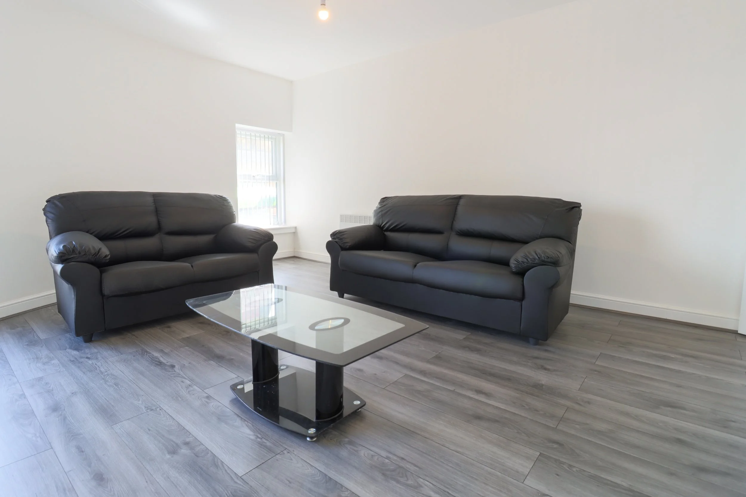modern-living-room-with-two-sofas-and-table-2026-04-15-05-11-30-utc.jpg