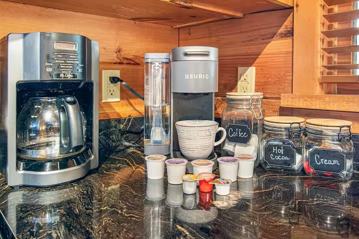 But First, Coffee!! We know that early morning cup of Joe is critical to your vacation. This home has a standard slow drip coffee machine, as well as a Keurif coffee maker (also a small selection of K-Cups, creamers, sugar, filters, and grounds).