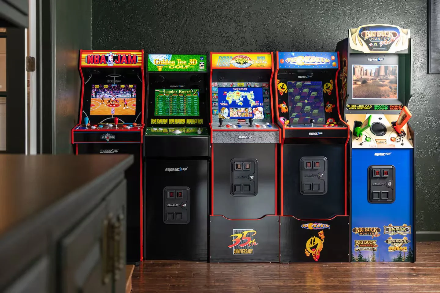 The living room features two leather couches, comfy swivel chairs, coffee tables, and a 75-inch smart TV. With direct patio access and a wet bar, it’s perfect for relaxation, entertainment, and hosting friends in a stylish & sizable functional space.