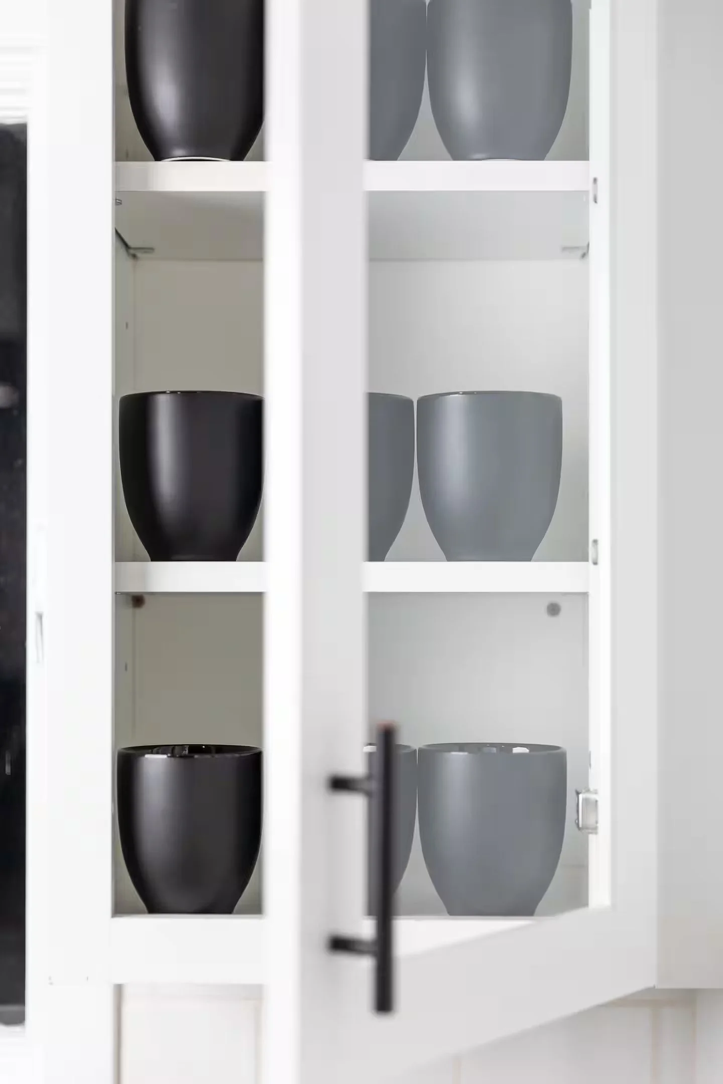 A fully stocked kitchen includes spices, silverware, plates, bowls, children's dinnerware, 2 crockpots, blender, toaster, knife set, pots, pans, baking sheets, drinking glasses, wine glasses, beer glasses, coffee mugs, barbecue utensils, and more.
