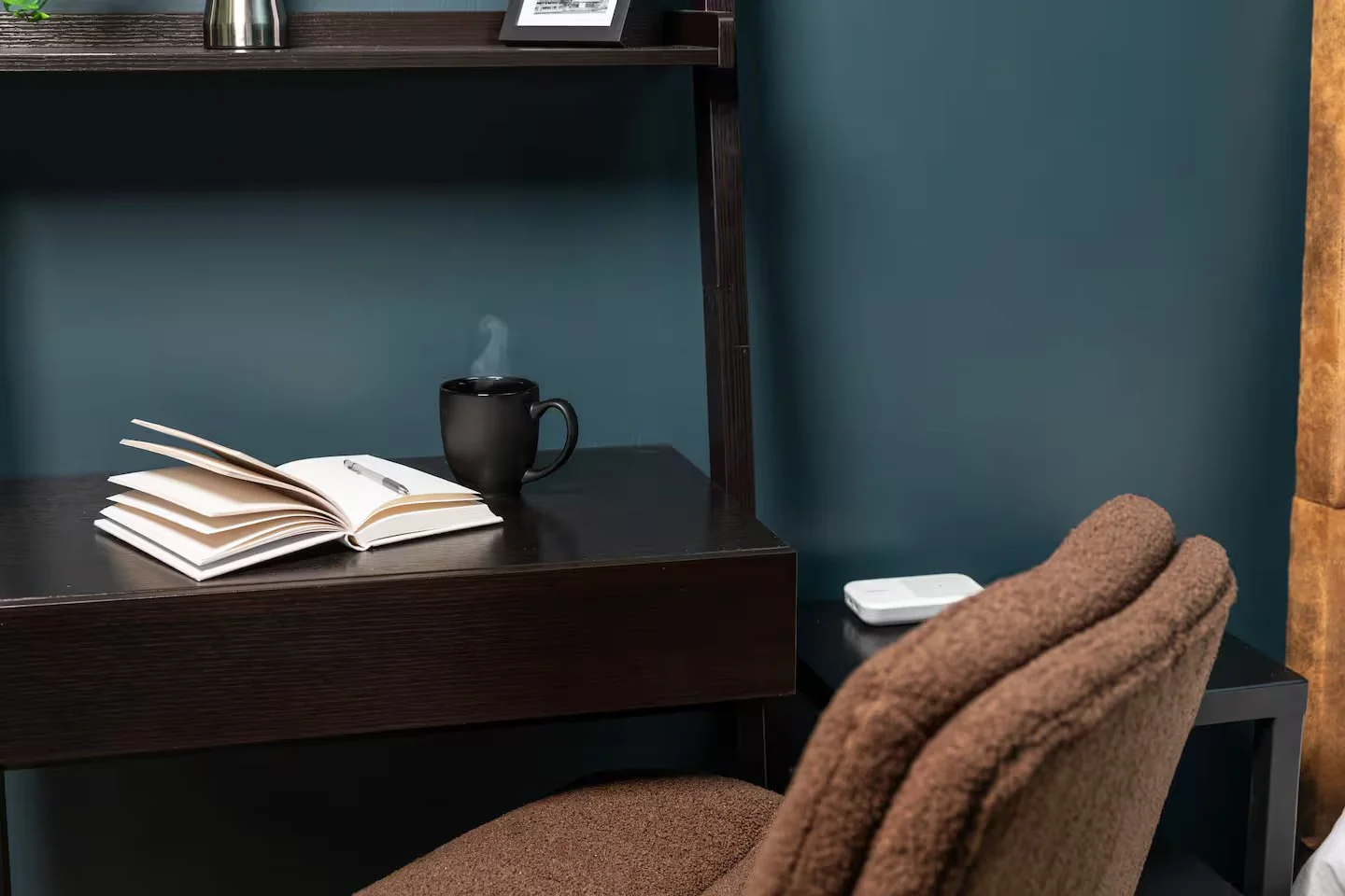 Downstairs, located in Bedroom 4, a dedicated home office and workstation is provided, featuring a desk, wireless phone chargers, high-speed WiFi, an office chair, and a quiet space to work or study comfortably.
