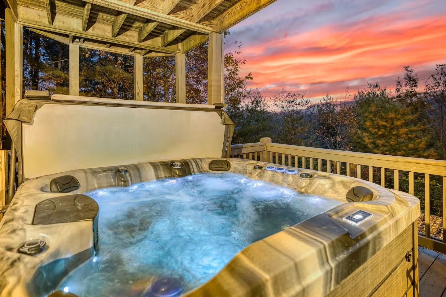 The 7-person Jacuzzi on the lower-level sits outside the game room with stunning mountain views. Freshly cleaned, serviced, and balanced between every stay, it’s the perfect spot to soak, relax, and enjoy the peaceful North Georgia Mountain scenery.