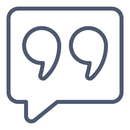 Icon of a speech bubble with quotation marks inside.