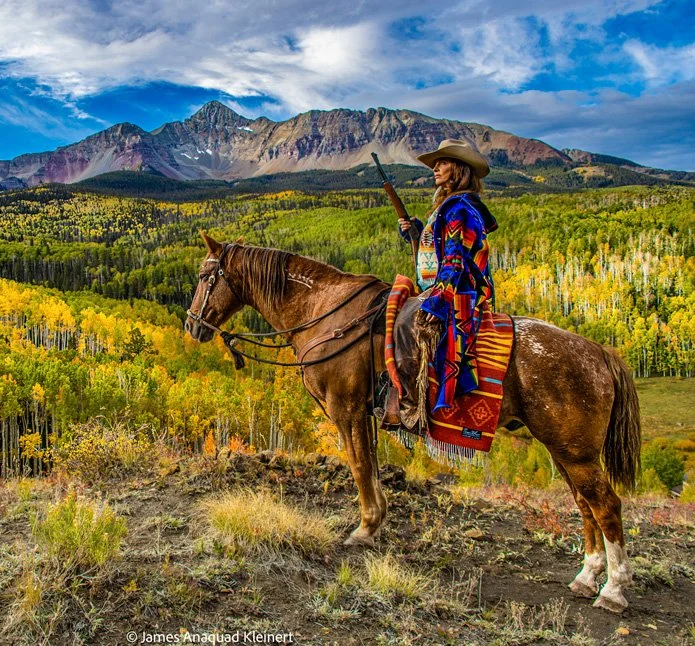 Lisa riding a horse