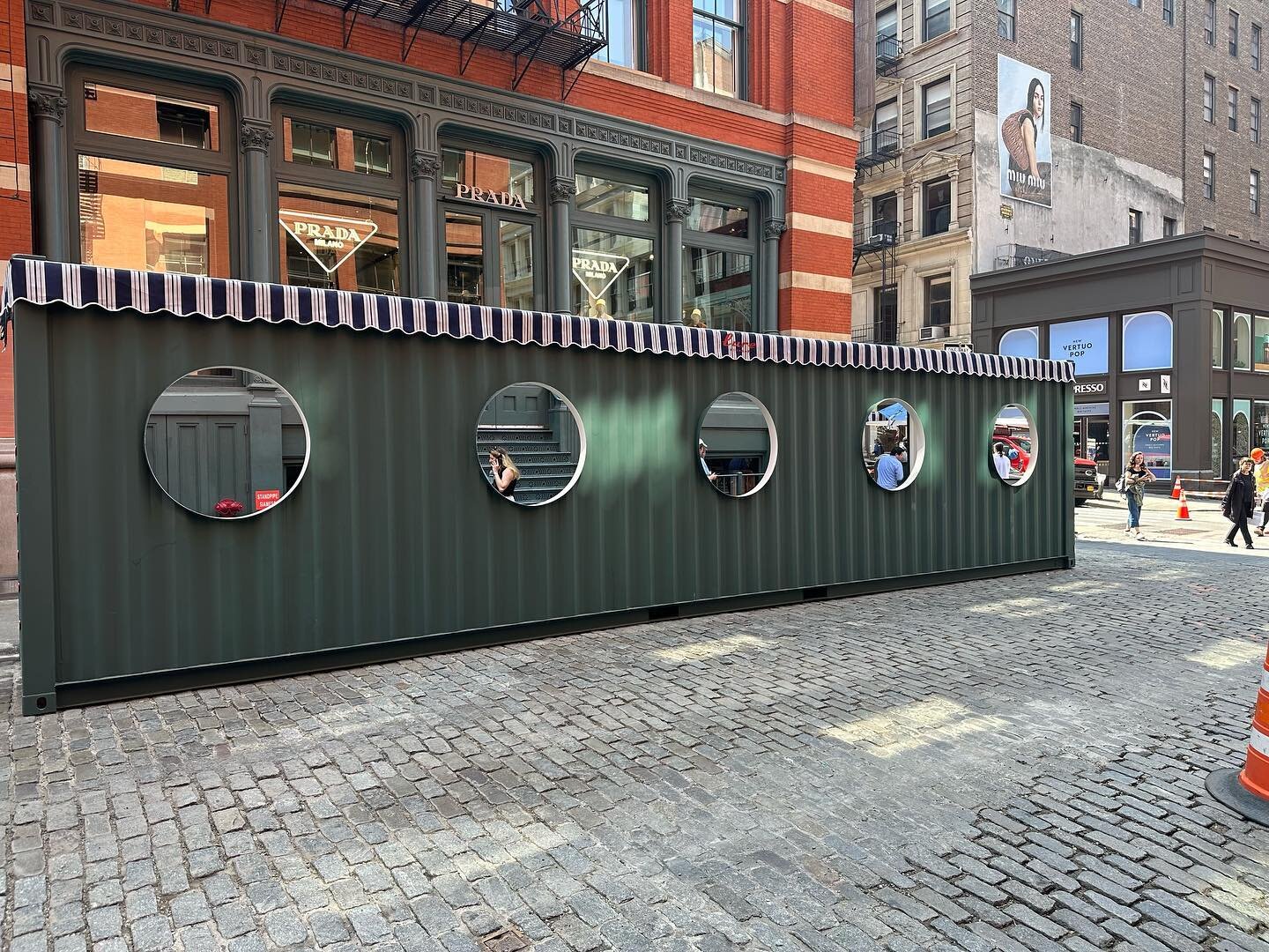 A new iconic outdoor dining experience at @lurefishbar. Stop by and check out this amazing structure made of recycled shipping containers in the heart of Soho. DM or check out our website for more info!