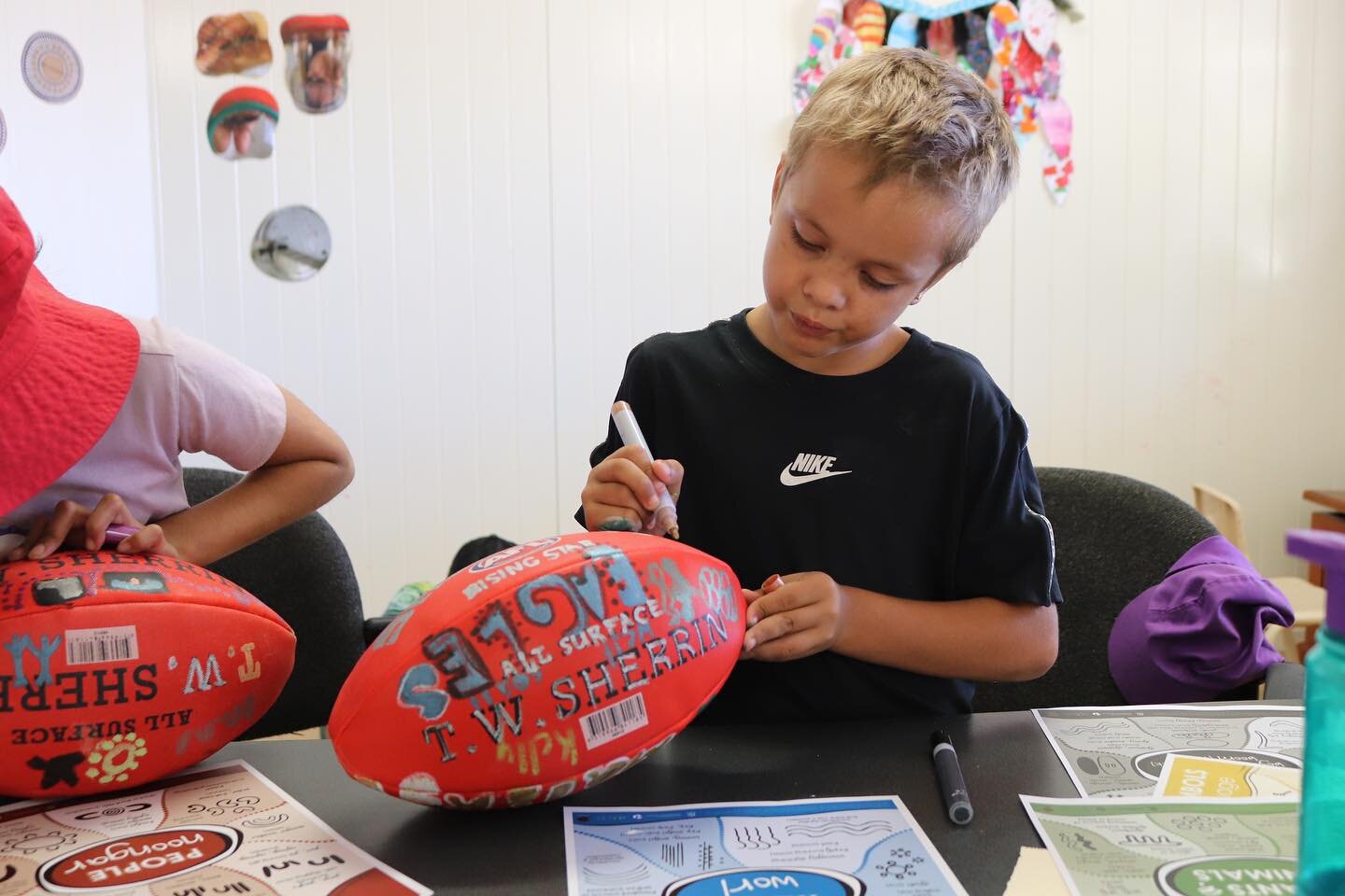 Footy season 😎 Today each child in the vacation care program received their own football to personalise and take home.