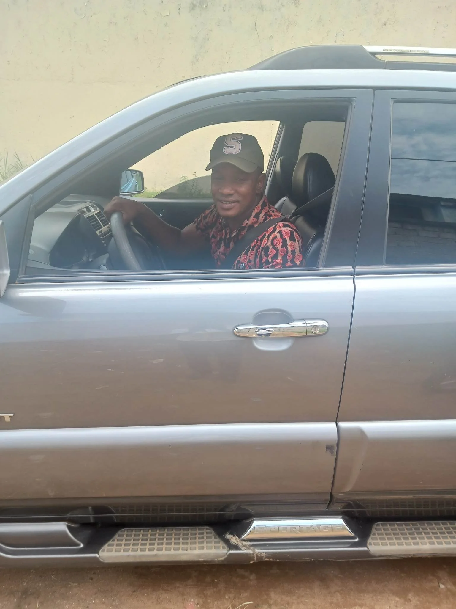 Abdul Jalloh, Driver’s Ed Graduate, Drops By the UDSVTC in a jeep