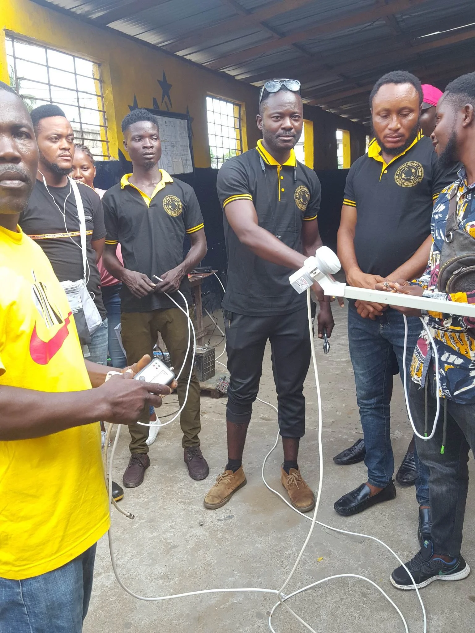 Satellite Installation Students Learn How to Connect an Analog Finder to Track the Dish
