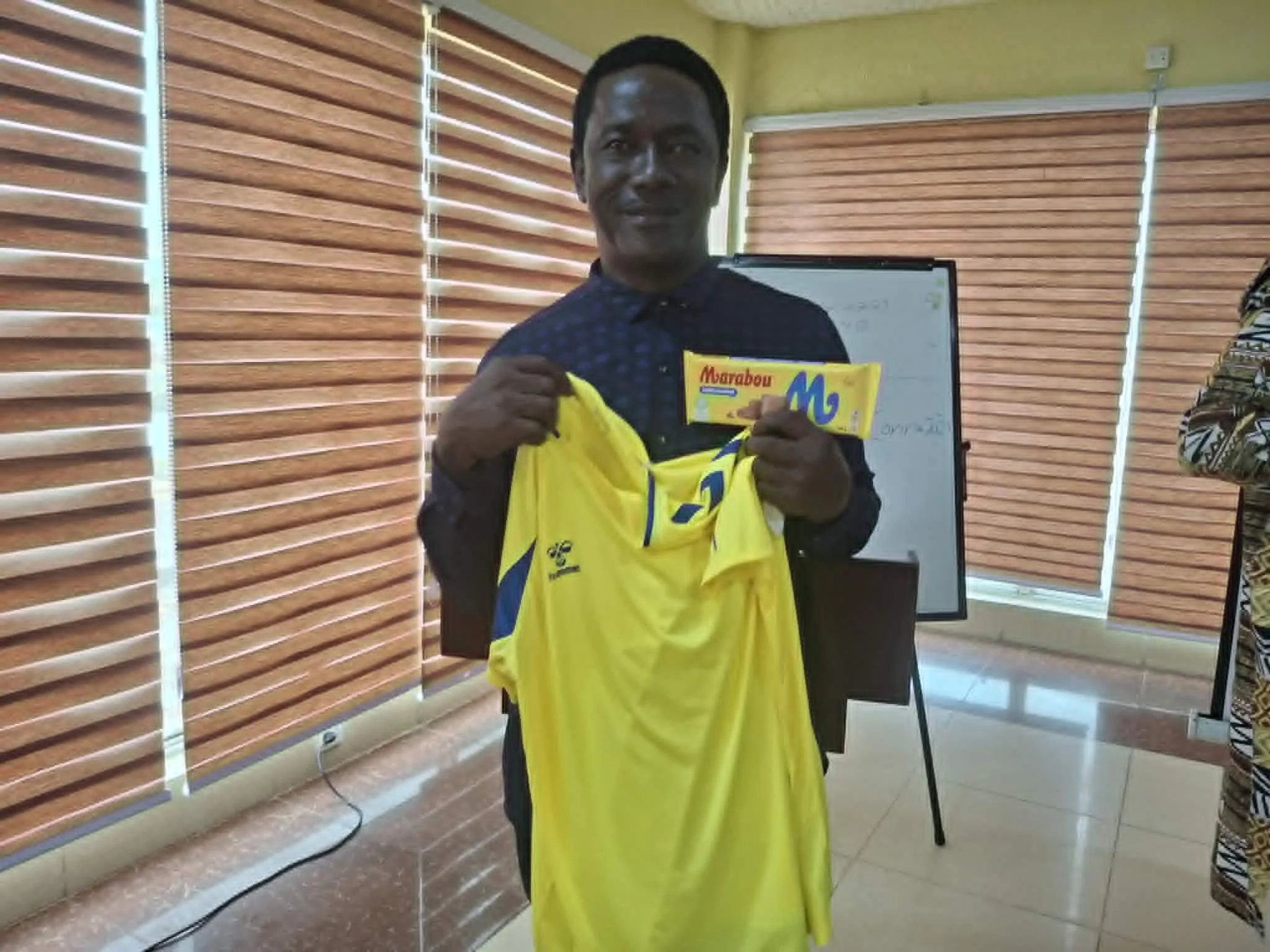 Kelvin Fomba with gifts