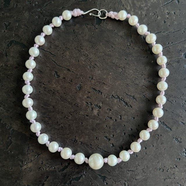 White Freshwater Pearls with Knotted Lilac Silk