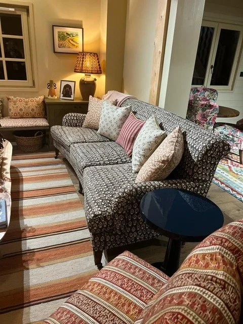 curved sofa and arm chair