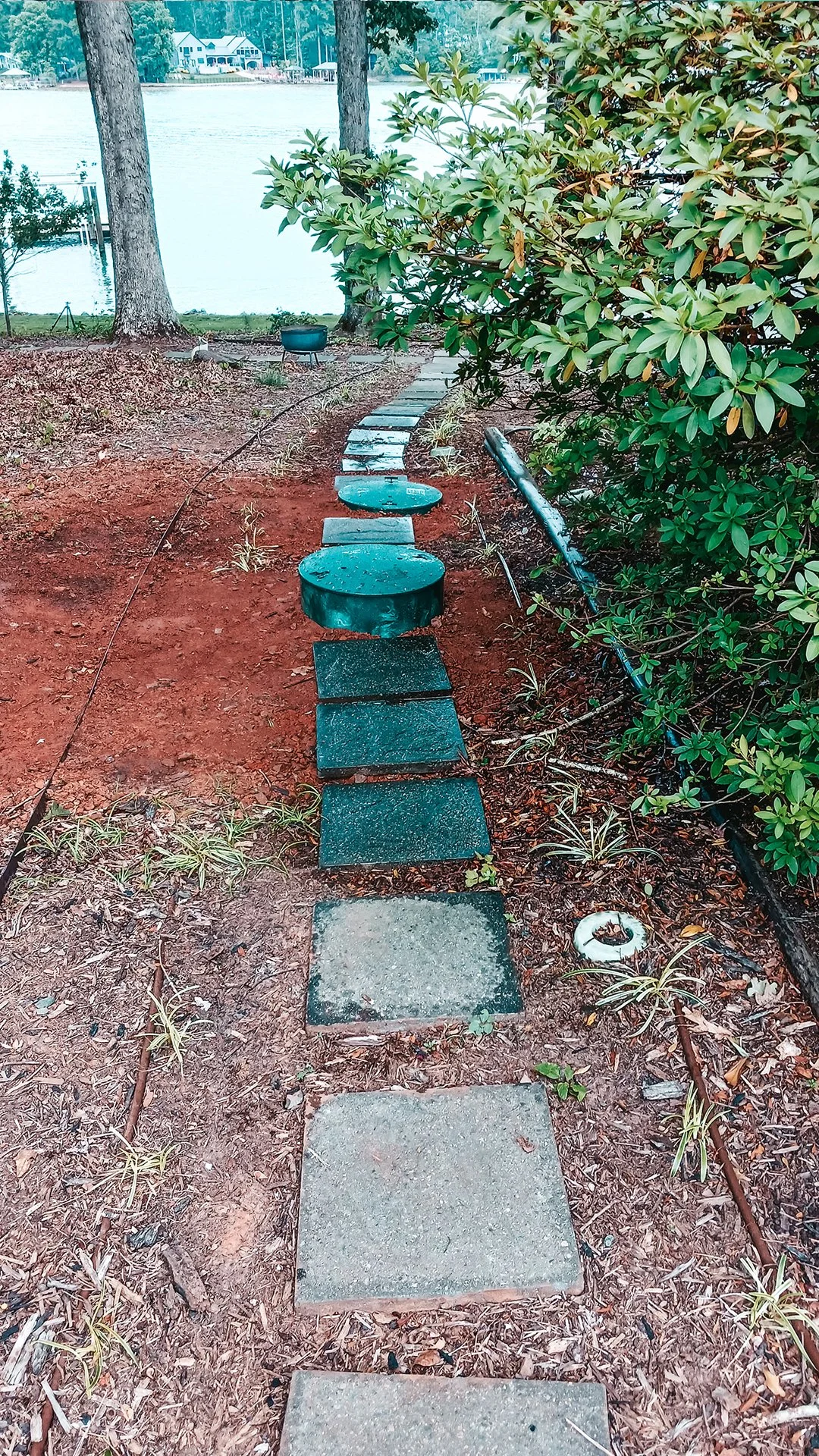 Septic riser installation.