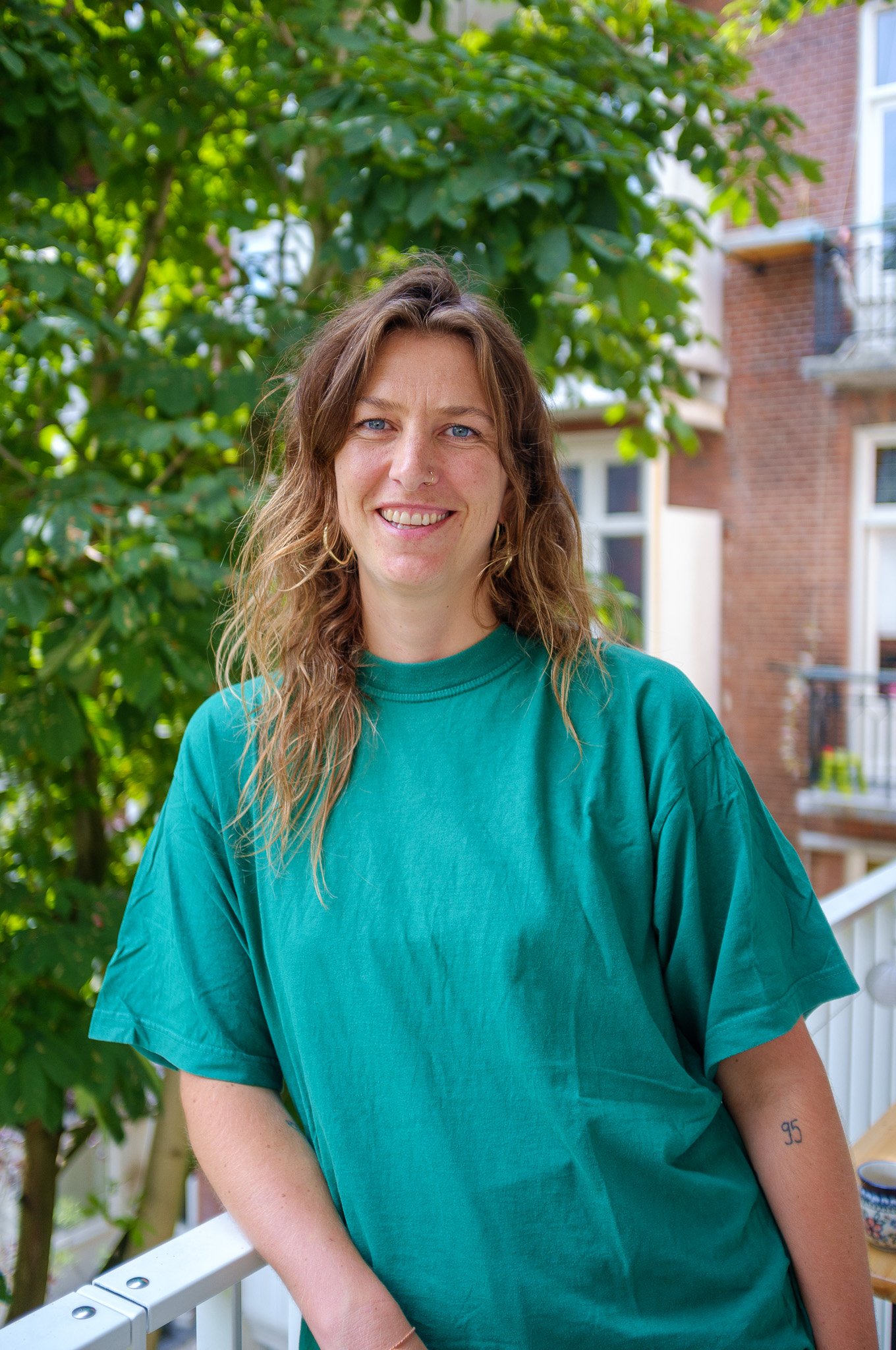Hanneke Jepma van Kollectief Thuis in een groen t-shirt