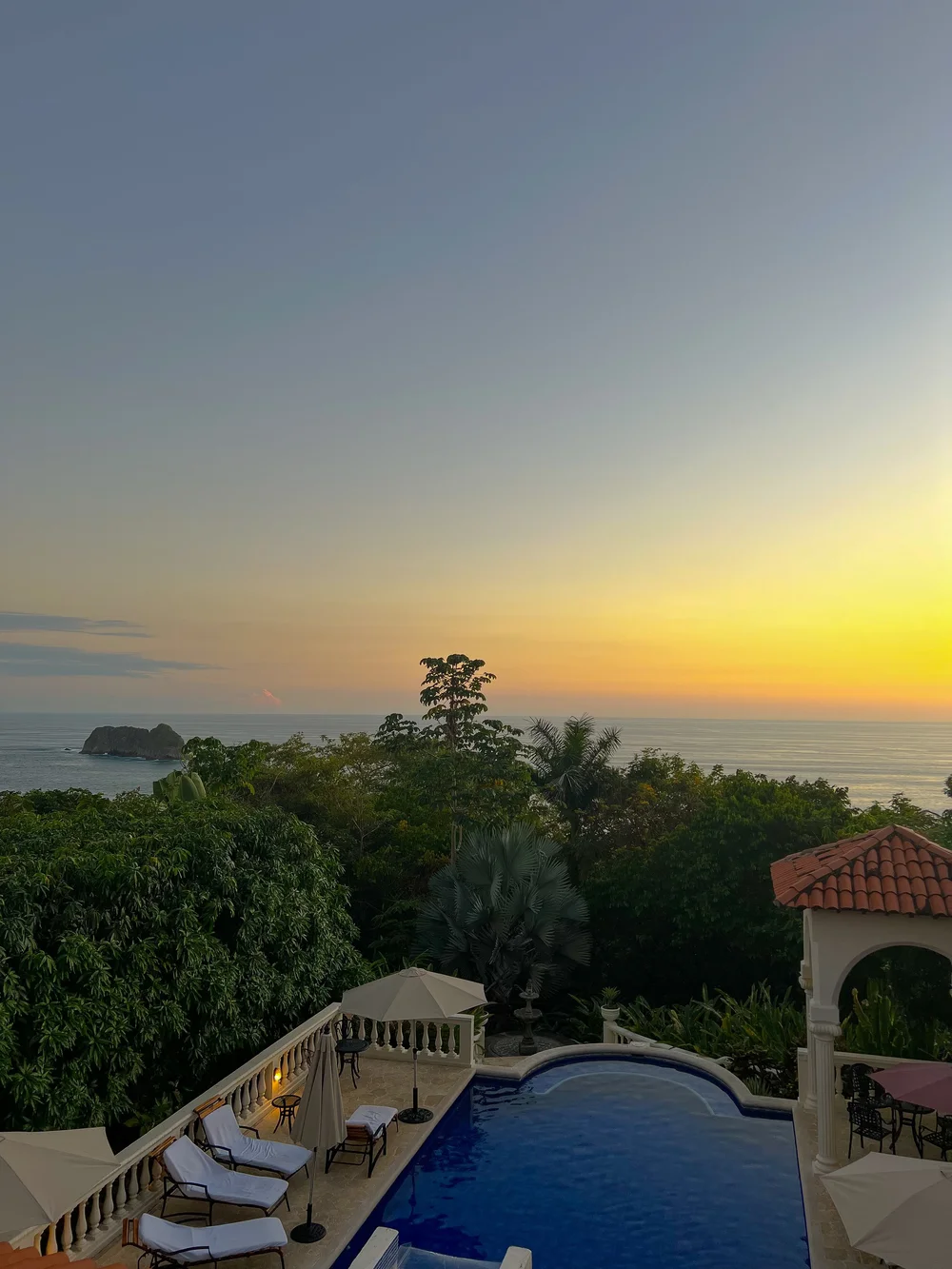 Parador infinity pool sunset vertical.JPEG