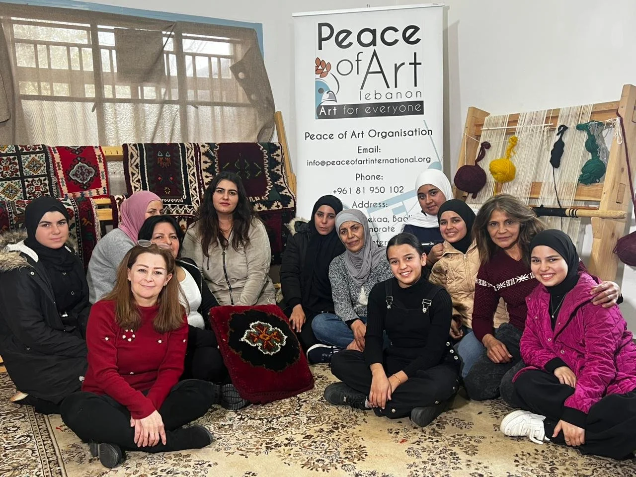 Women participating in traditional carpet workshop
