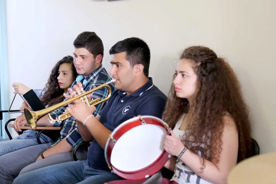 Lebanese and Syrian youth participating in creative activities