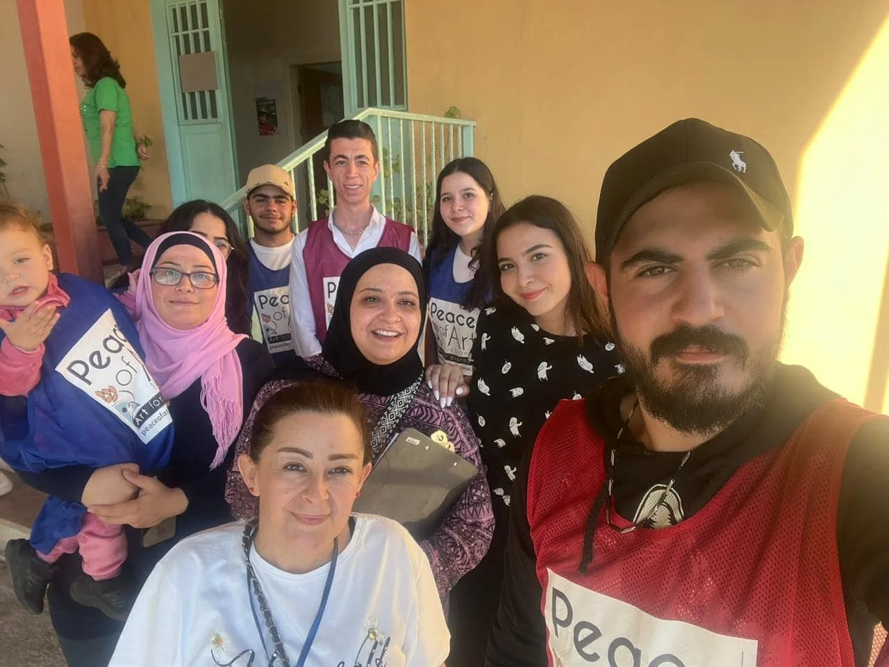 Peace of Art volunteer team supporting displaced families during war