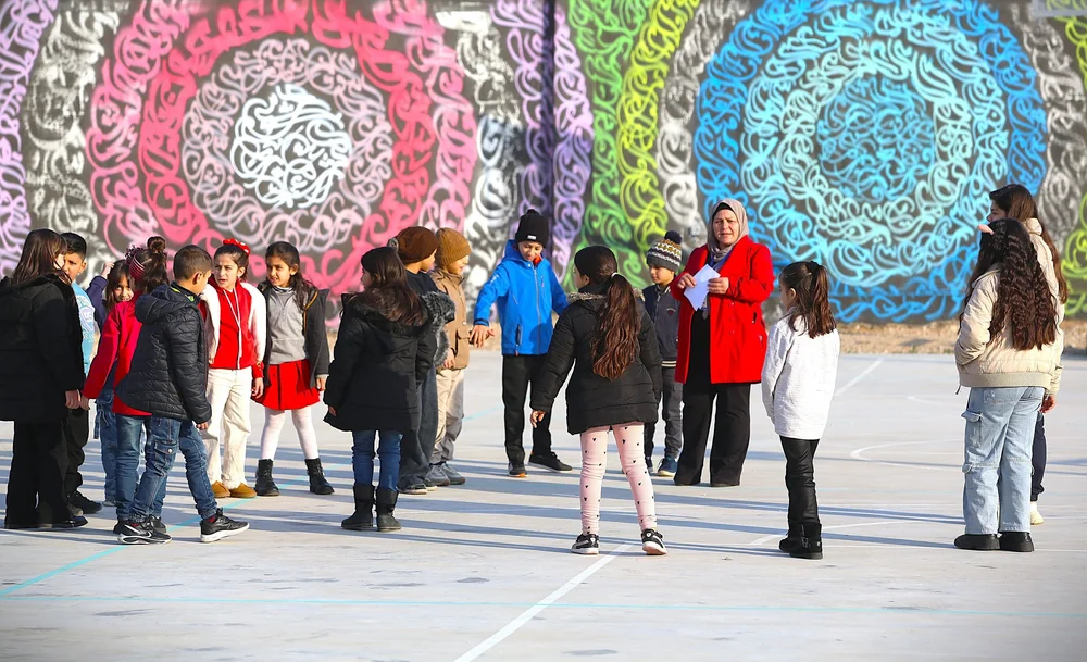Children taking part in outdoor Peace of Art recreational activities