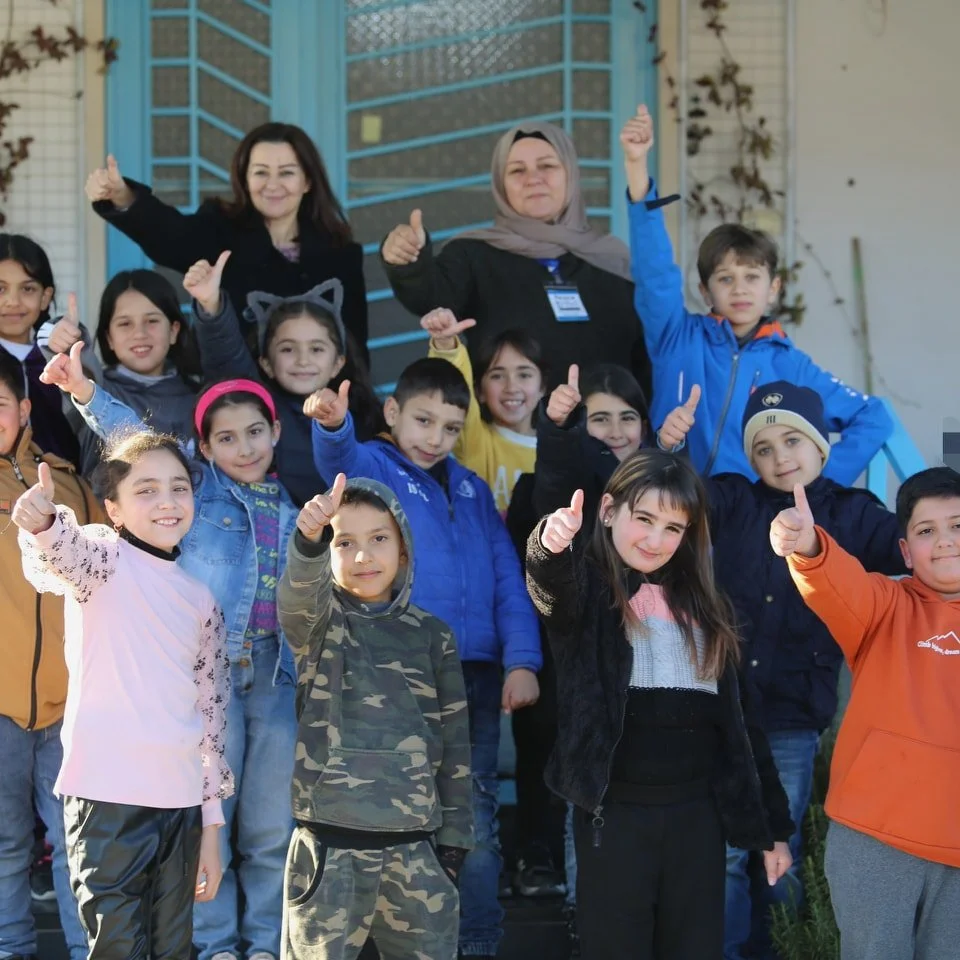 Children participating in Hekayatouna storytelling activities